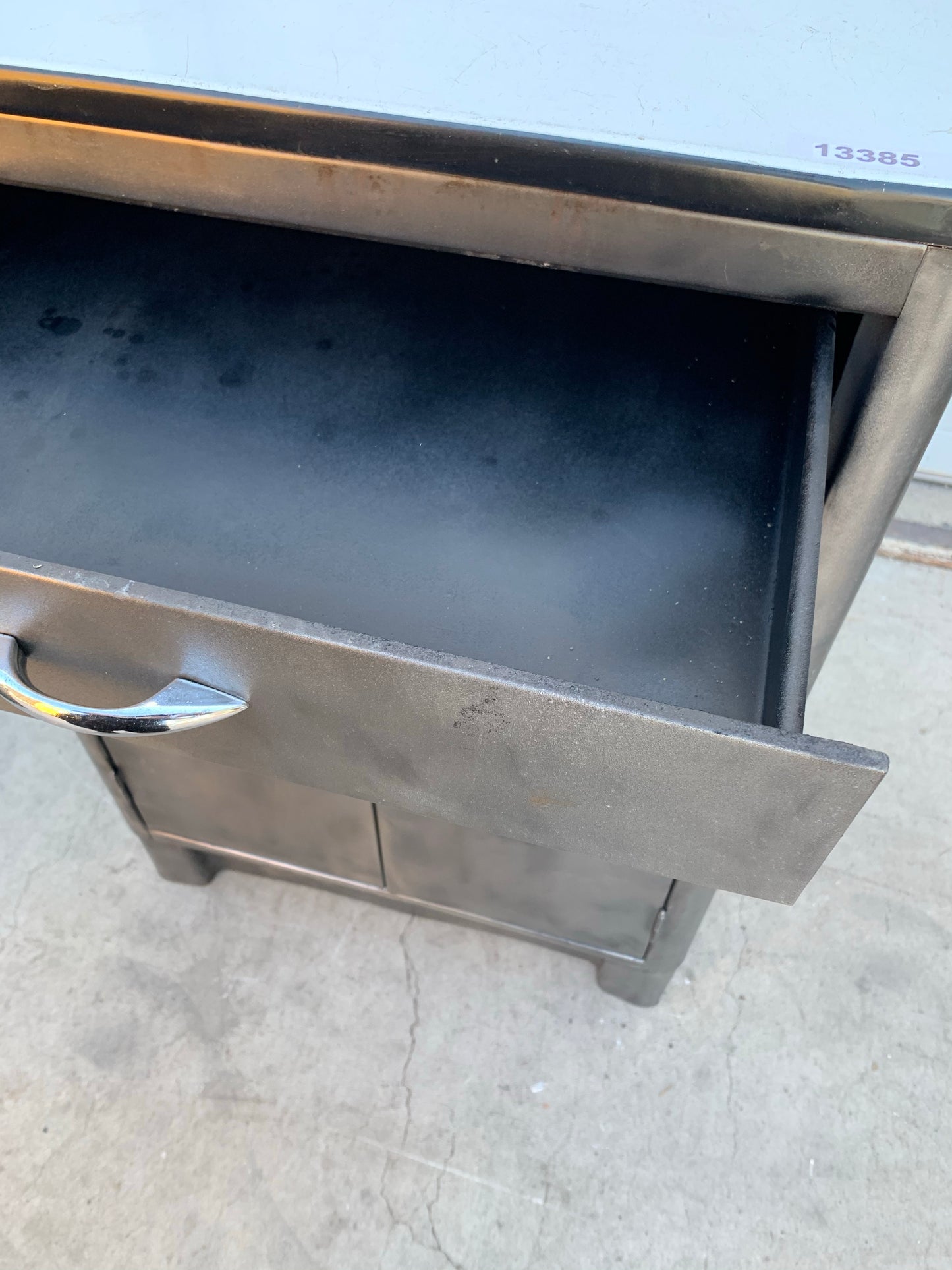 Stripped Steel Cabinet with Porcelain Top