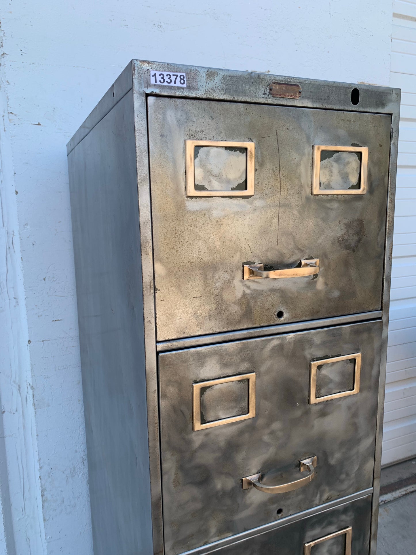 Stripped File Cabinet with Brass Handles