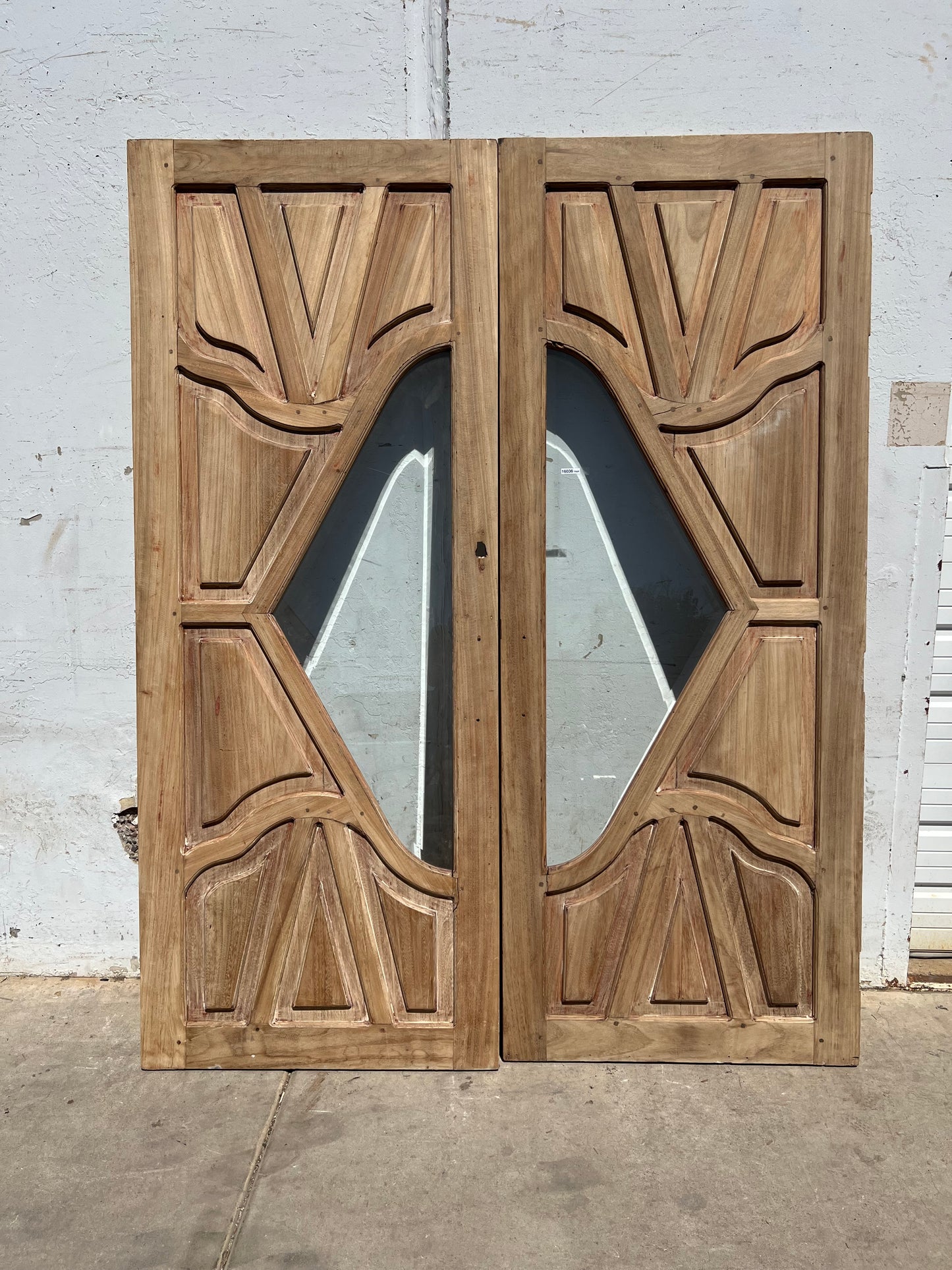 Pair of Carved Entrance Doors w/2 Single Glass Lites