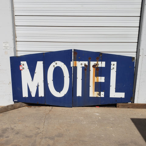 Blue and White “MOTEL" Sign