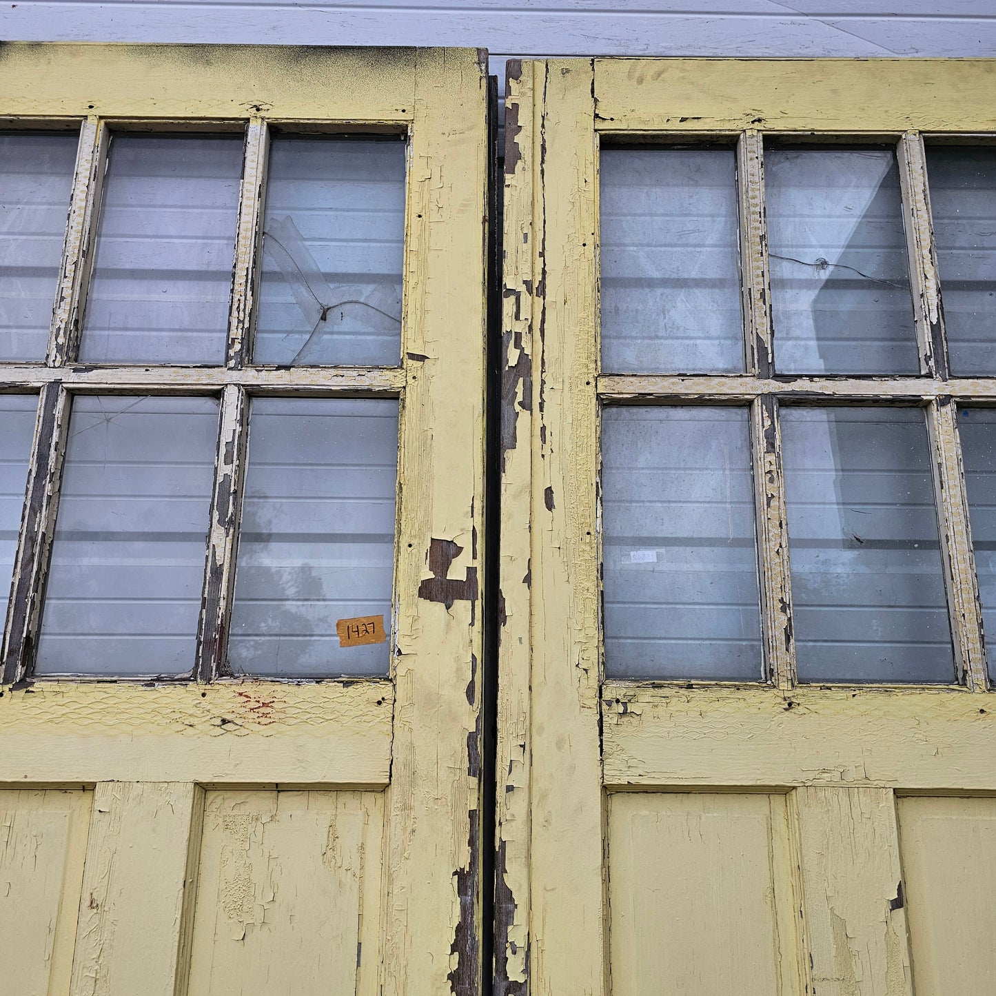 Pair of Large Yellow Carriage House Doors with 6 Lites