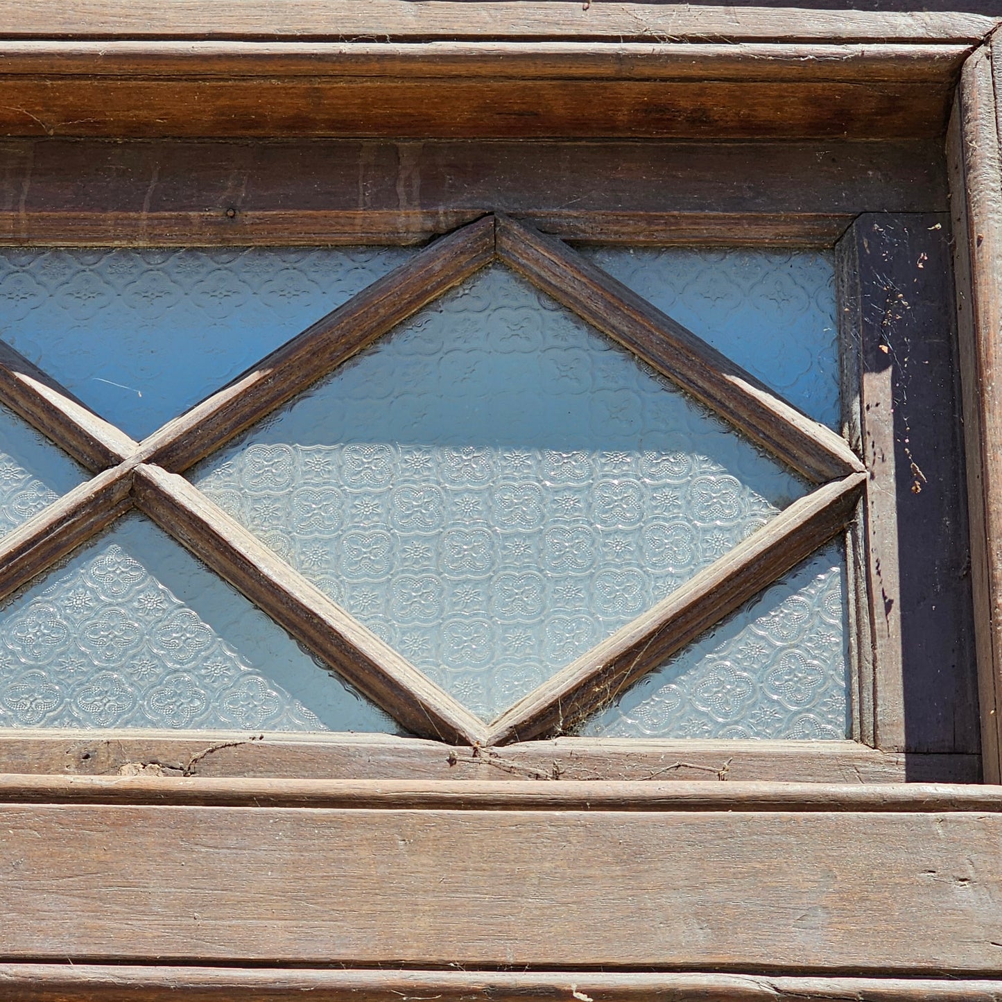 Pair of Wood Shuttered Doors with Glass Transom in Frame