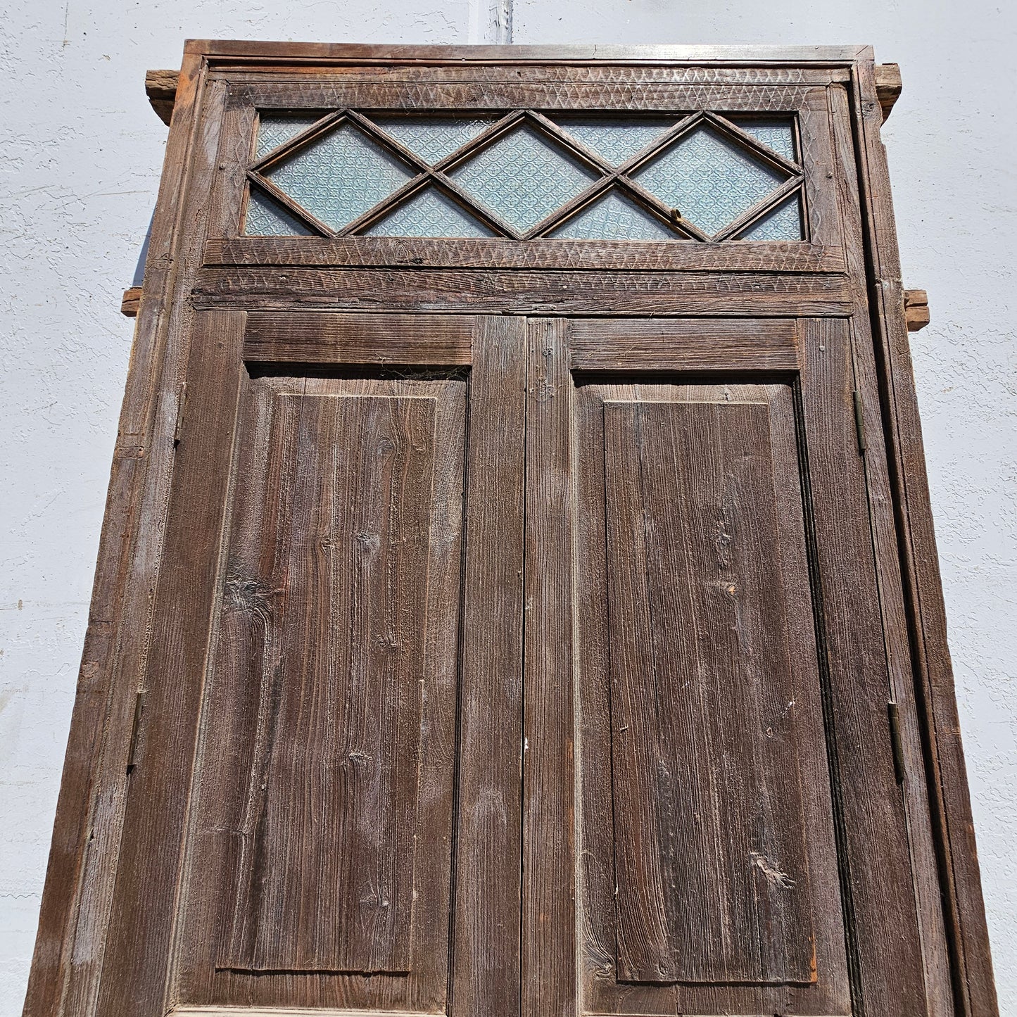 Pair of Wood Shuttered Doors with Glass Transom in Frame