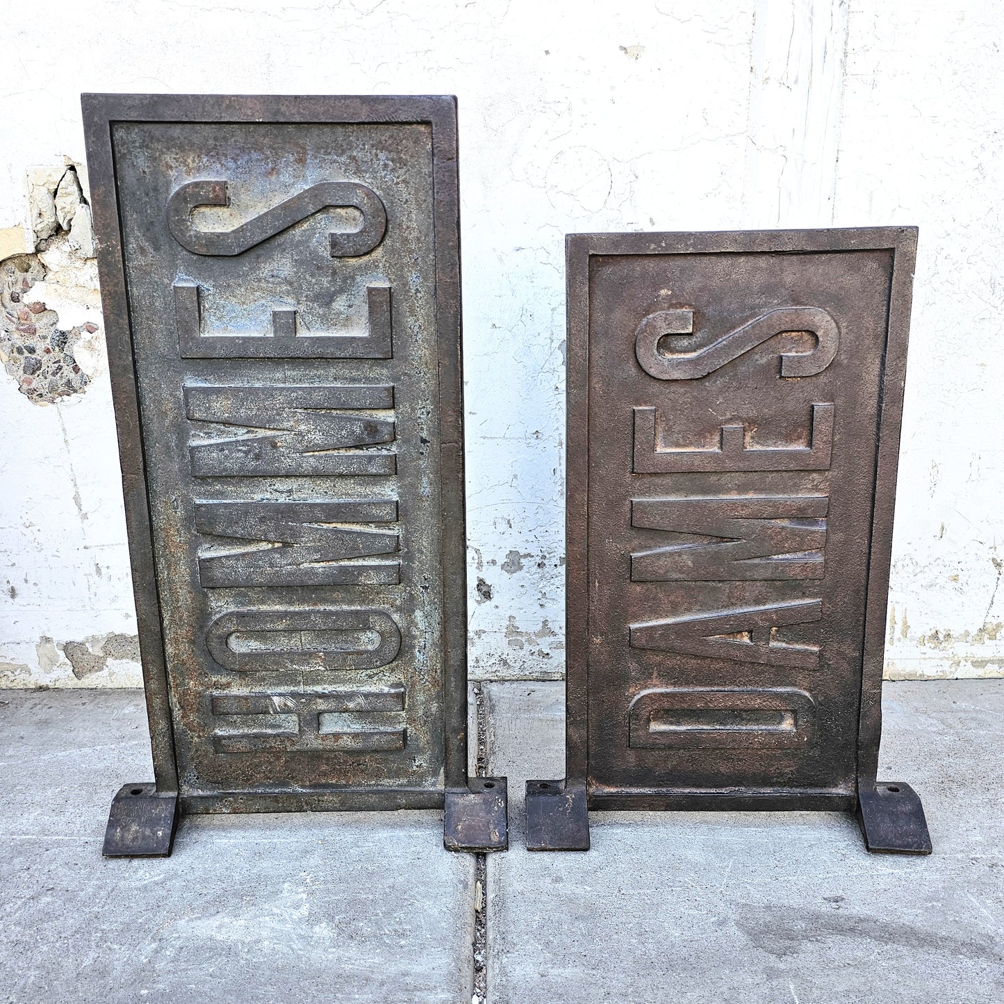 Pair of Dames & Hommes Iron Double Sided Signs