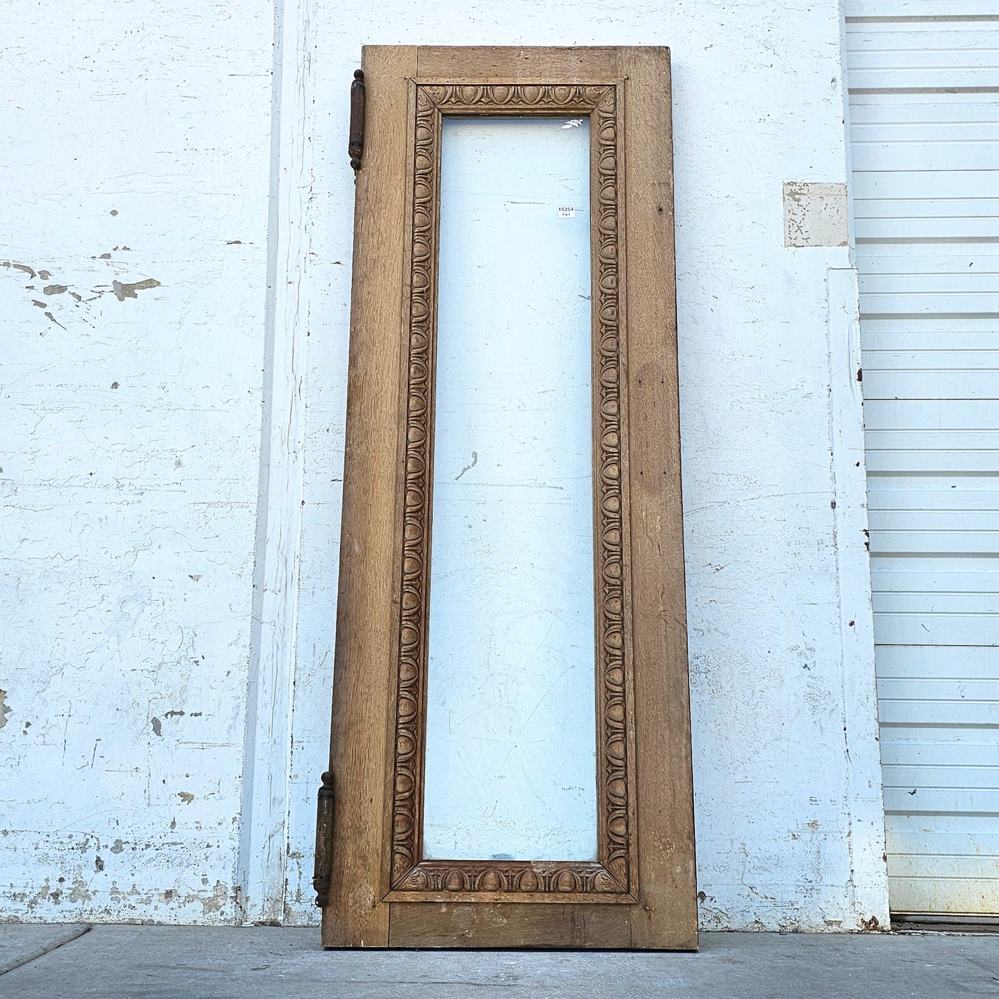 Single Antique Carved Wood and Single Lite Hotel Lobby Door