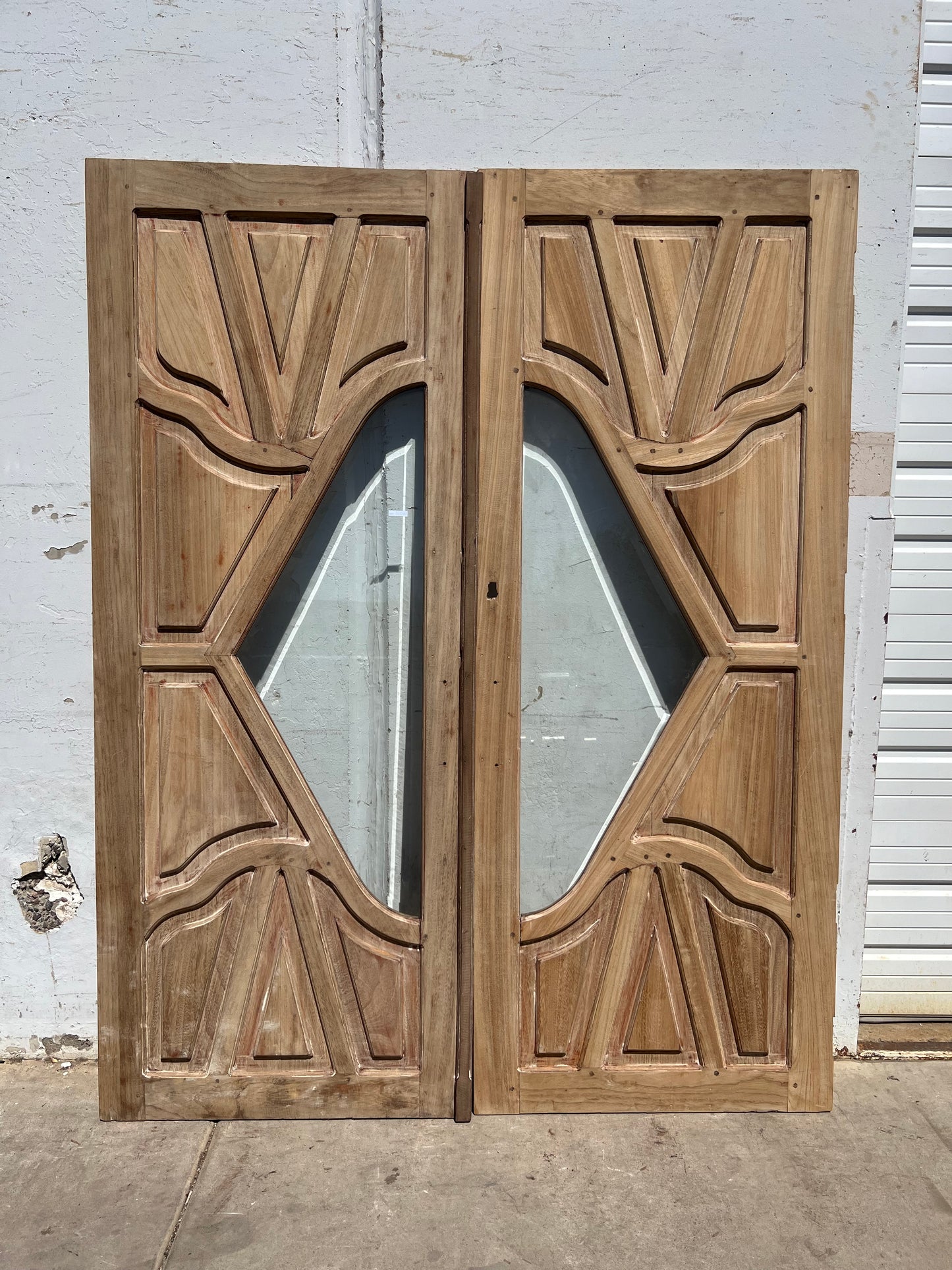 Pair of Carved Entrance Doors w/2 Single Glass Lites