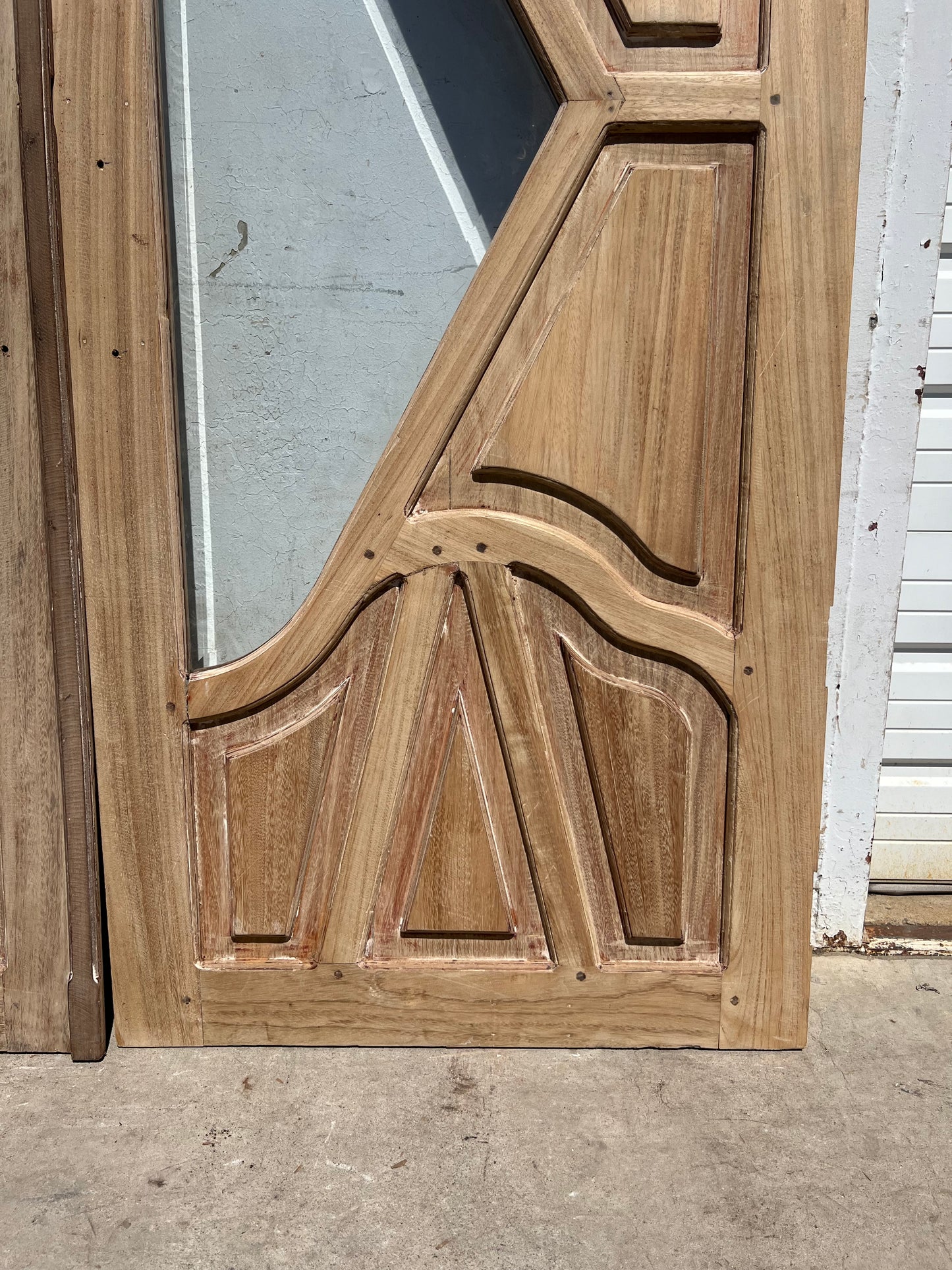 Pair of Carved Entrance Doors w/2 Single Glass Lites