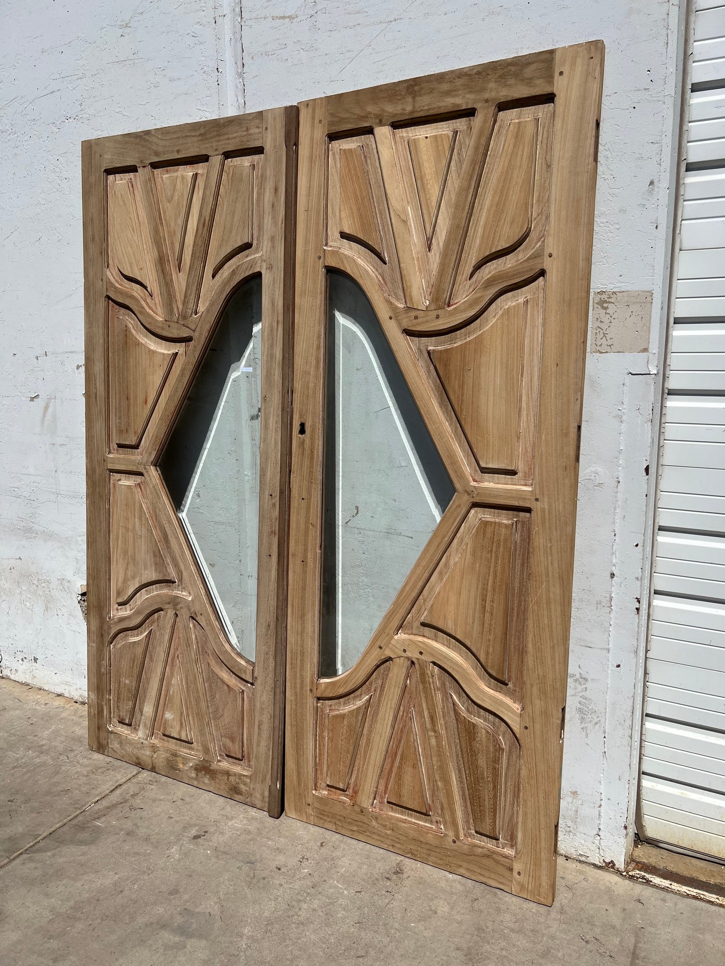 Pair of Carved Entrance Doors w/2 Single Glass Lites