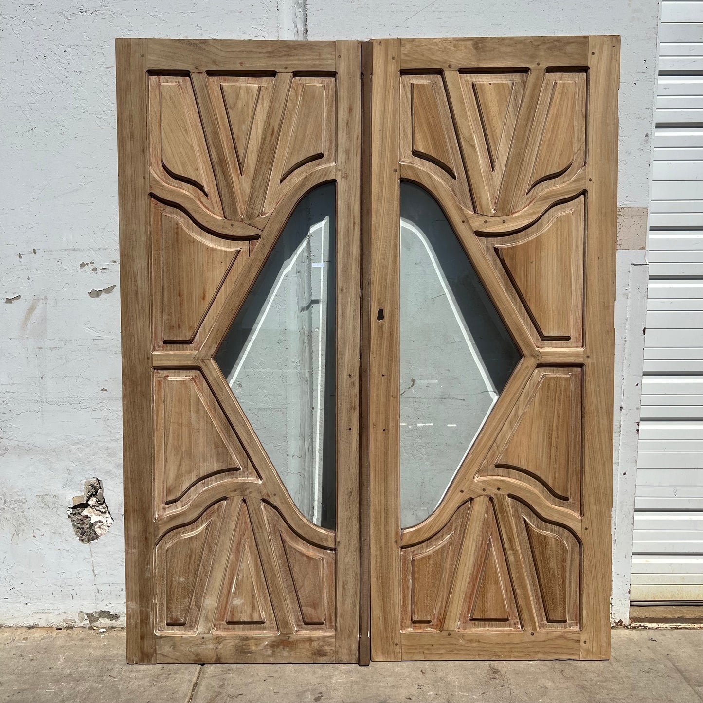 Pair of Carved Entrance Doors w/2 Single Glass Lites