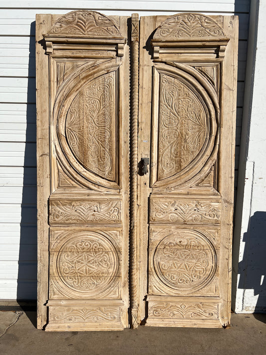 Pairof Bleached Carved Wood Doors with Circular Panels