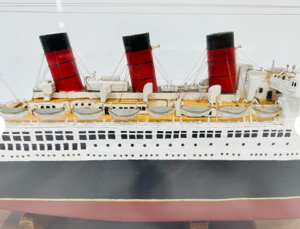 The Queen Mary in Glass Case
