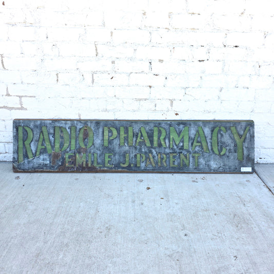 Radio Pharmacy Metal Sign on Wood