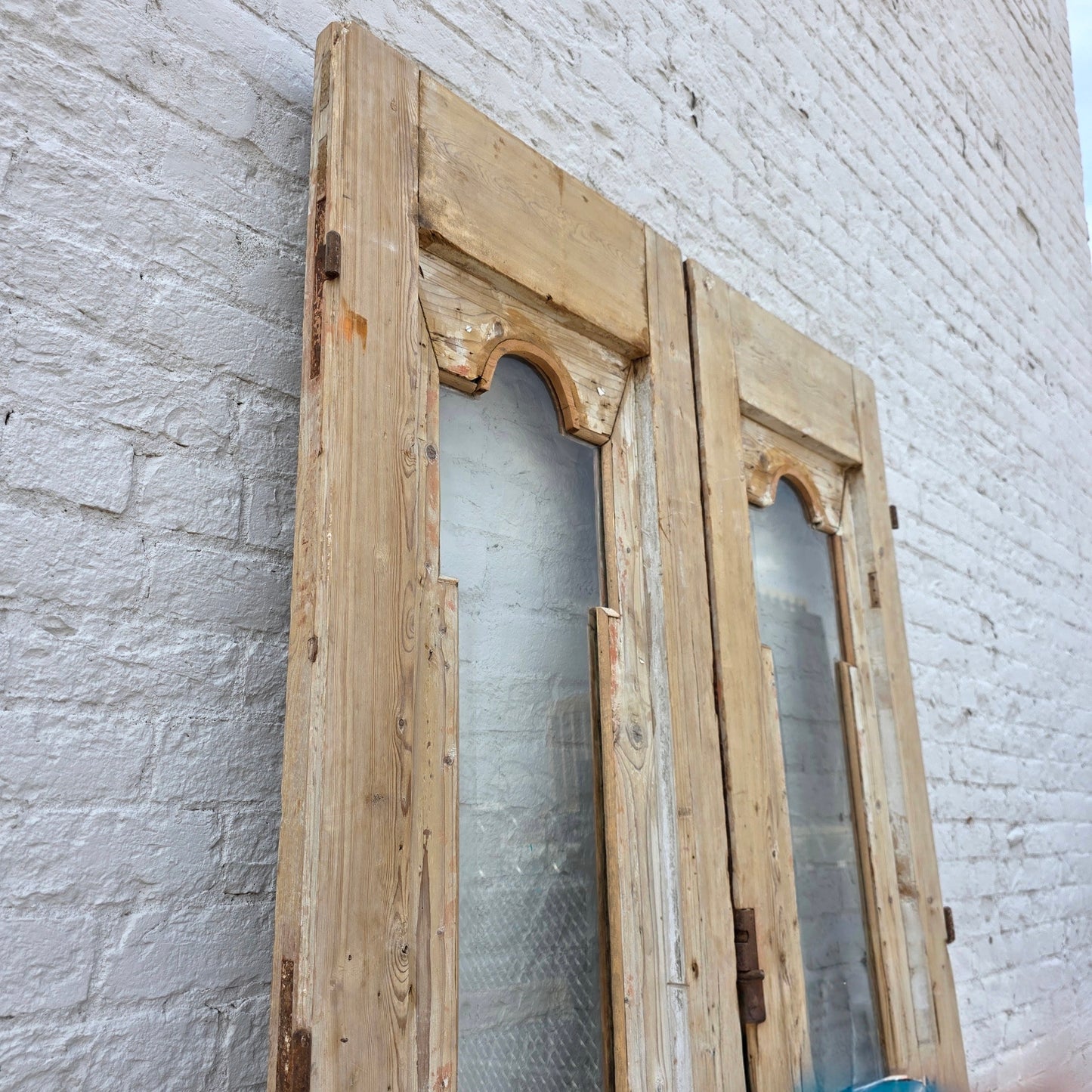 Pair of Antique Wood Carved Doors with Single Glass Lites
