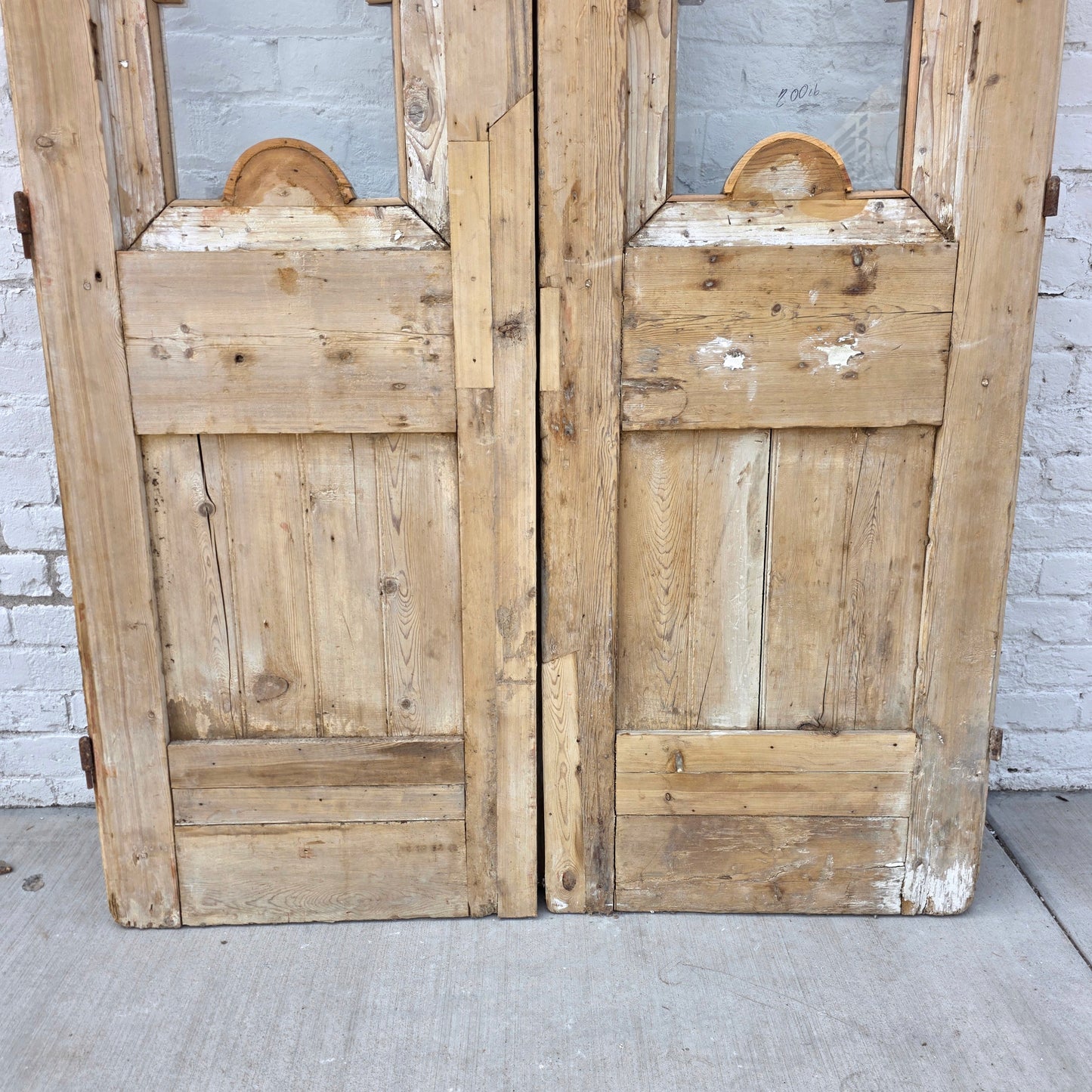 Pair of Antique Wood Carved Doors with Single Glass Lites