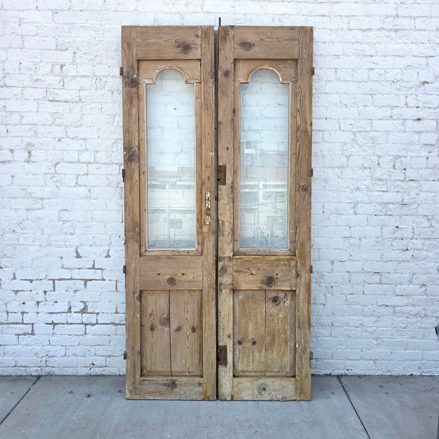 Pair of Carved Wood Doors w/2 Single Glass Lites