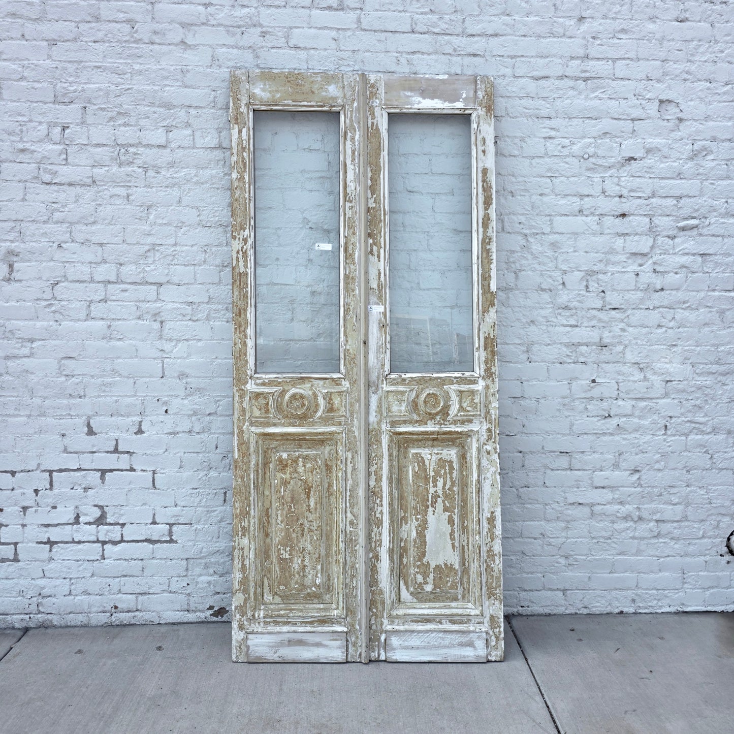 Pair of Washed Wood Single Lite Carved Antique Doors