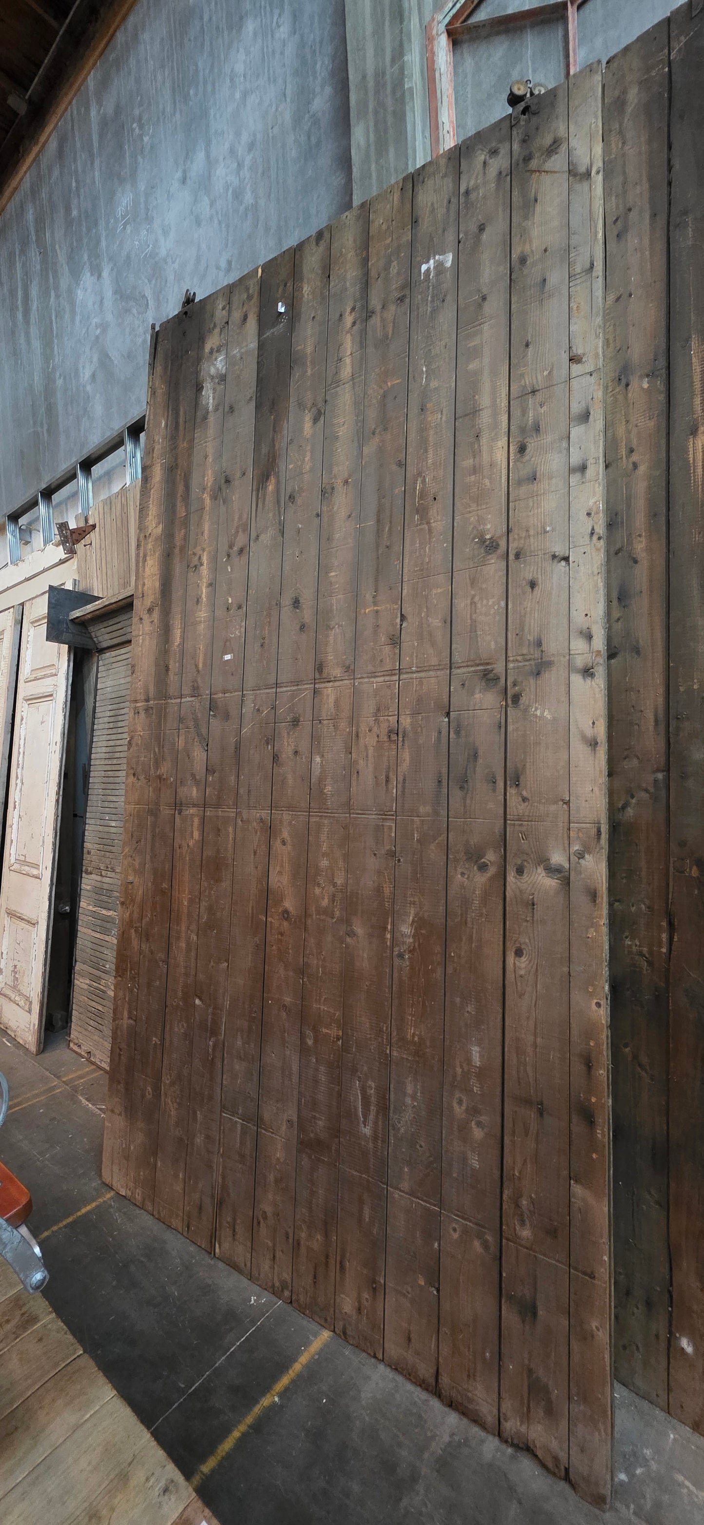 Pair of 11 Panel Natural Wood Barn Doors