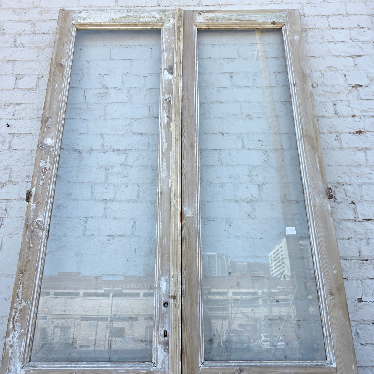 Pair of Washed Wood Single Lite Antique Doors