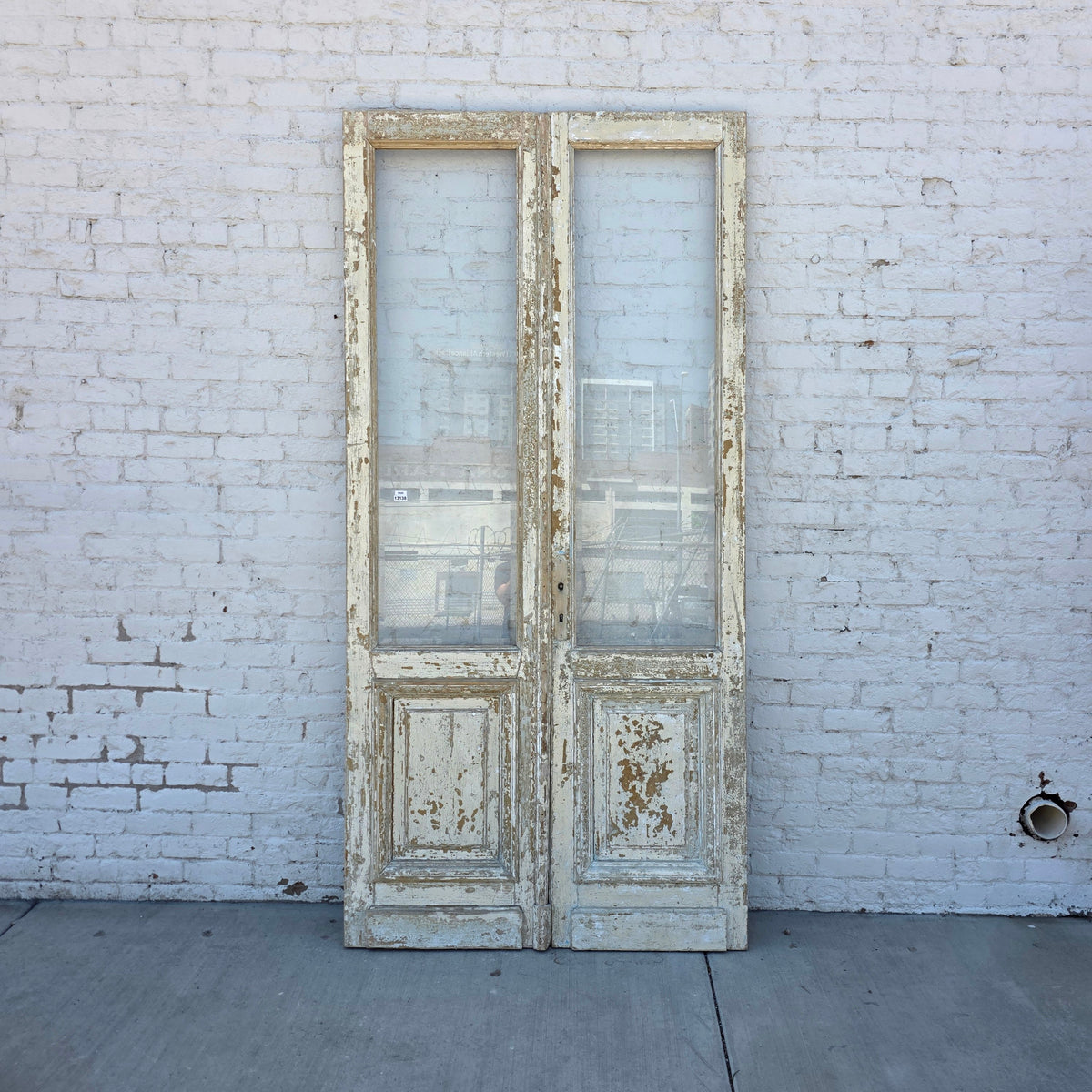 Pair of Washed Wood Single Lite Antique Doors