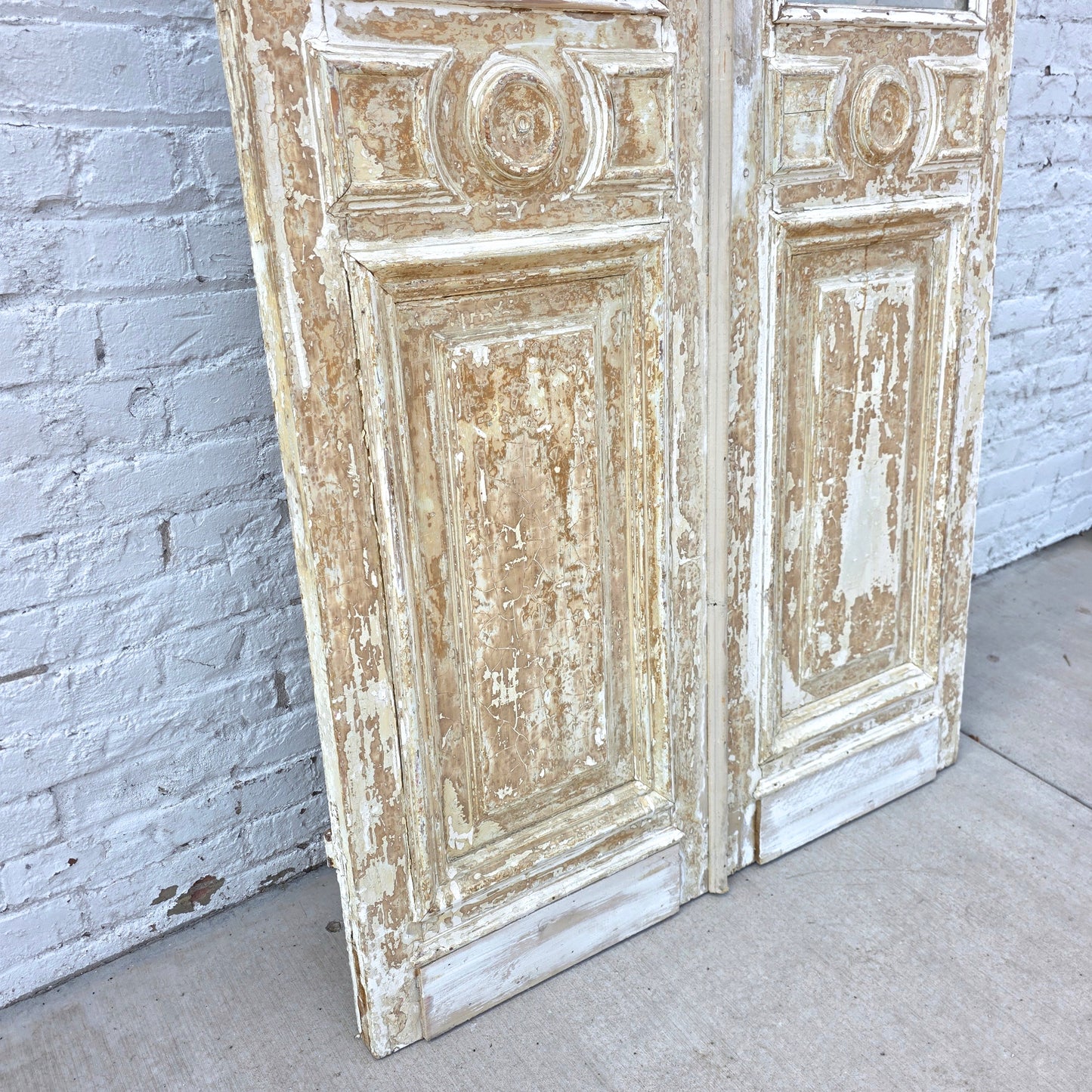 Pair of Washed Wood Single Lite Carved Antique Doors