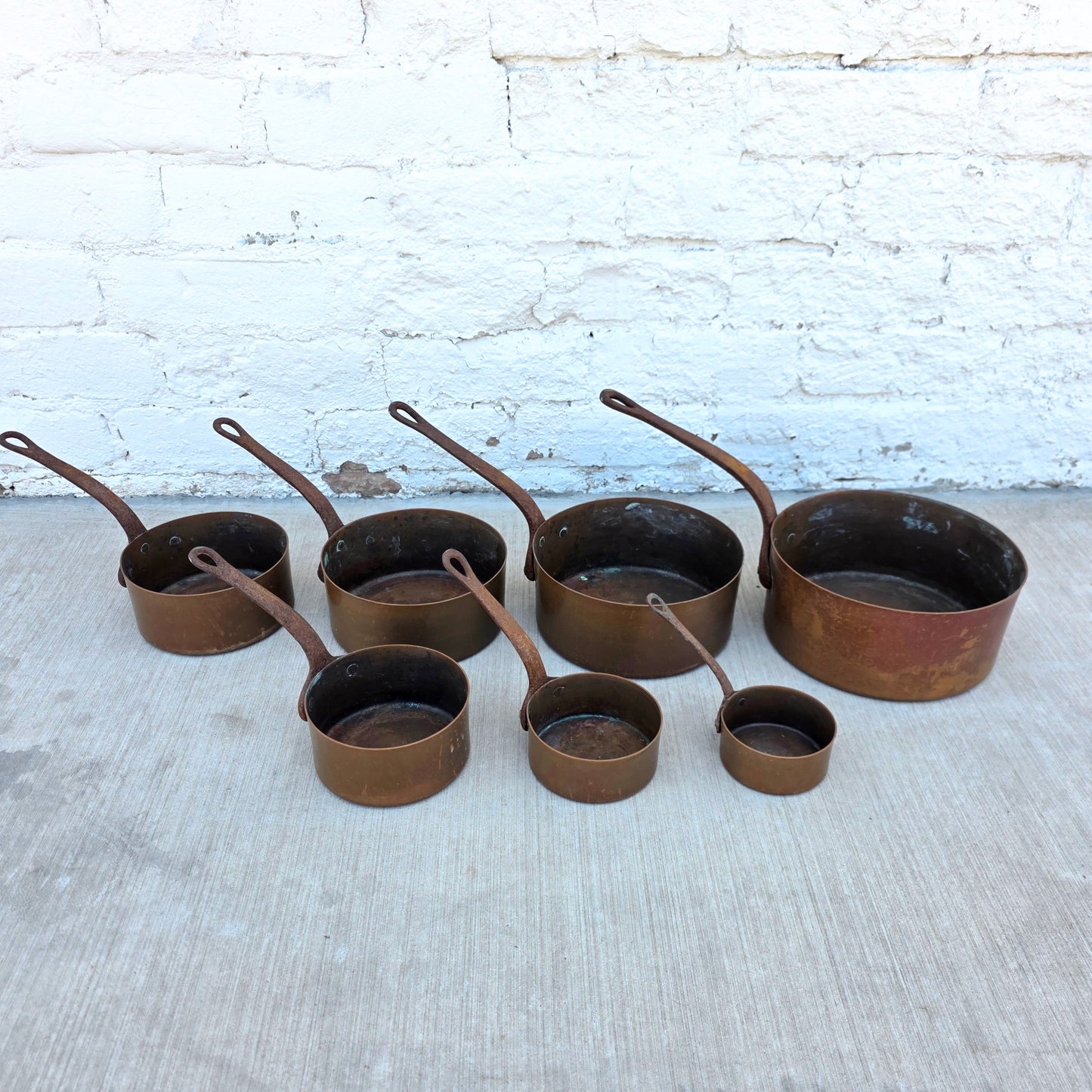 Set of 7 Graduating French Copper Pots