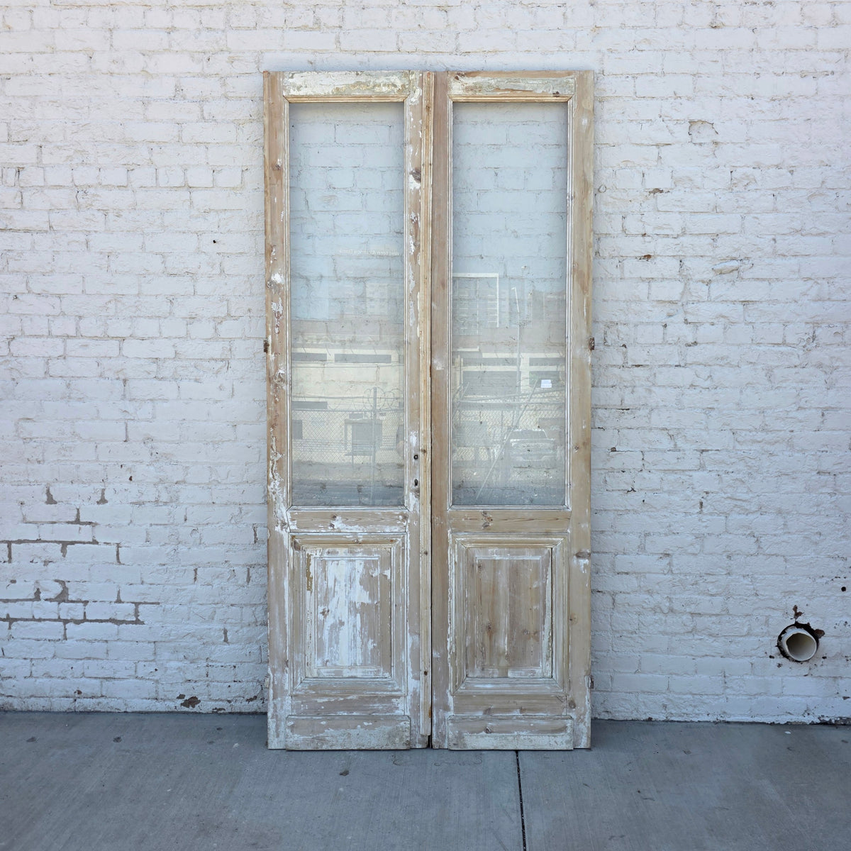 Pair of Washed Wood Single Lite Antique Doors