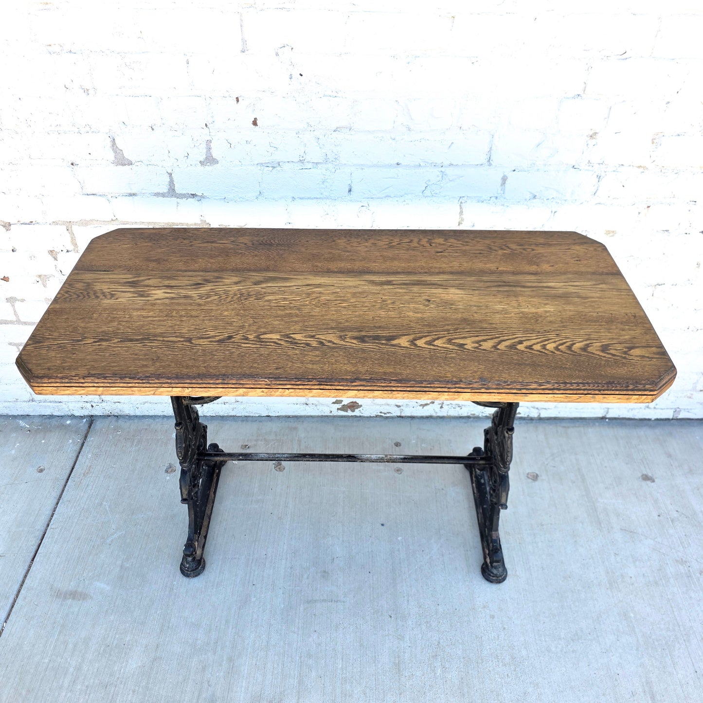 Antique English Pub Table with Ornate Iron Trestle Base