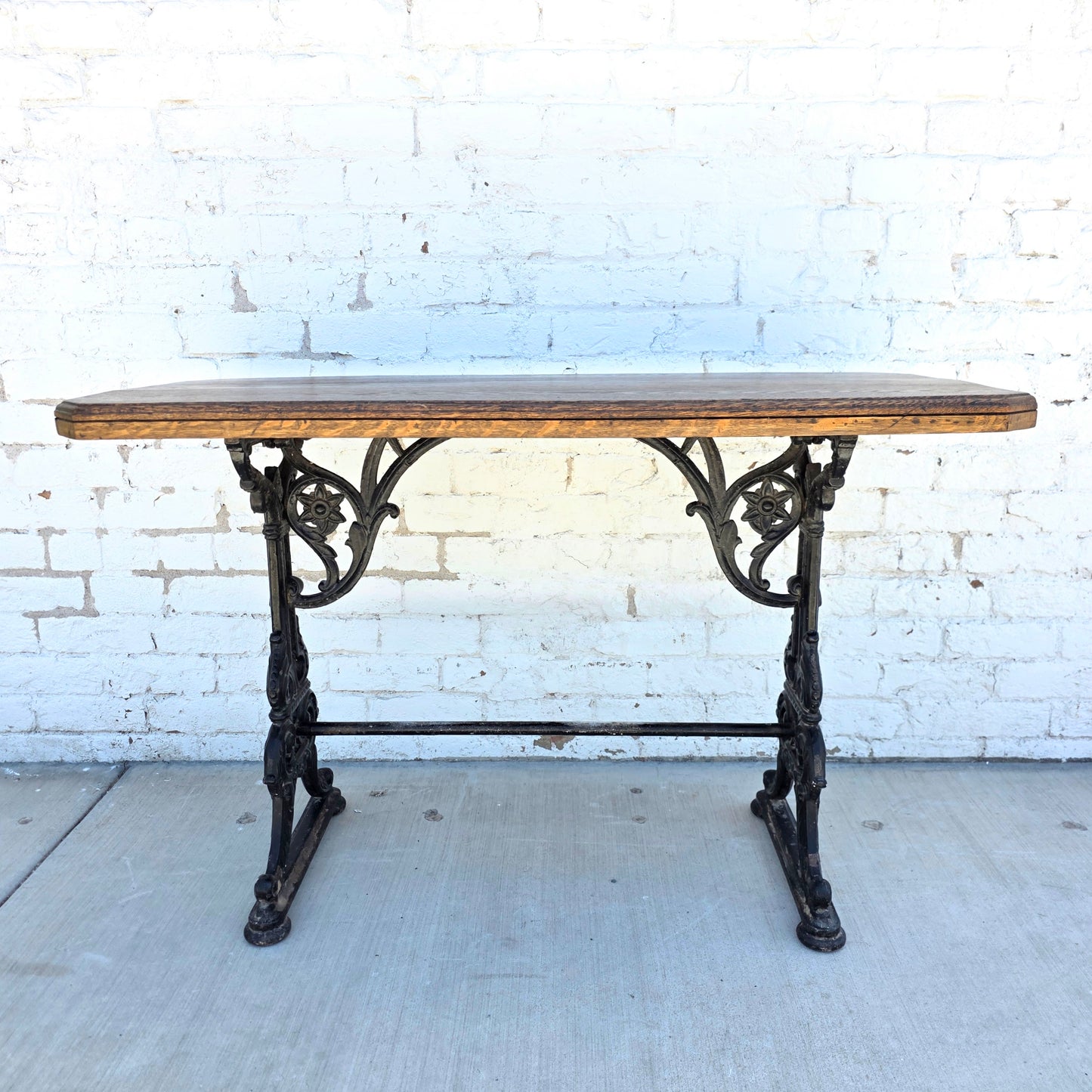 Antique English Pub Table with Ornate Iron Trestle Base