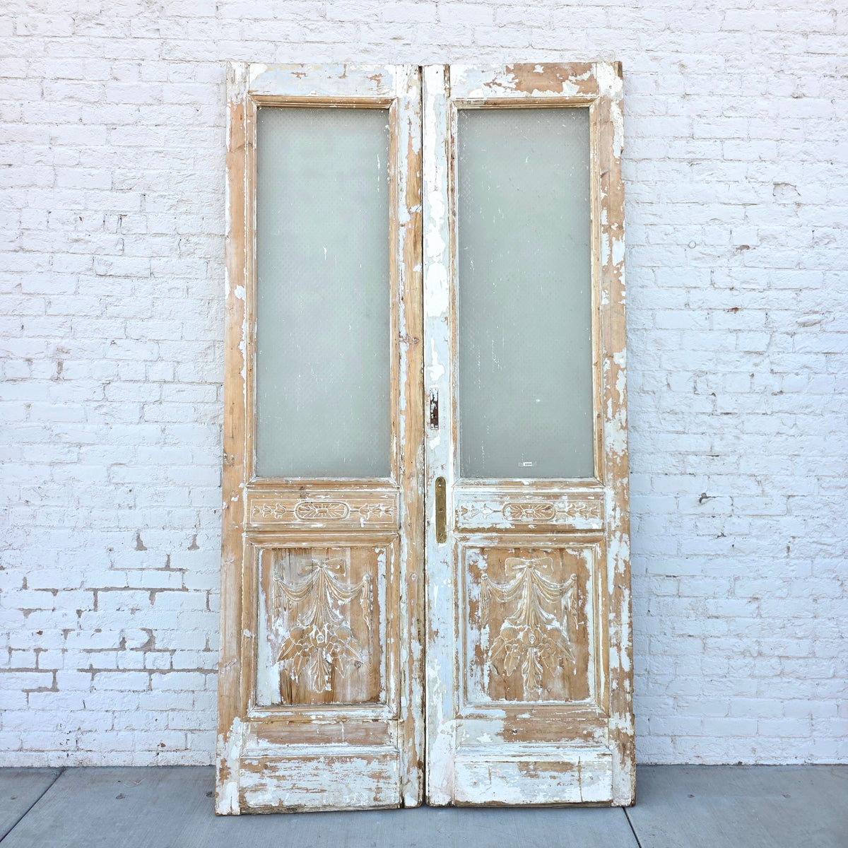 Pair of Single Lite Carved Doors