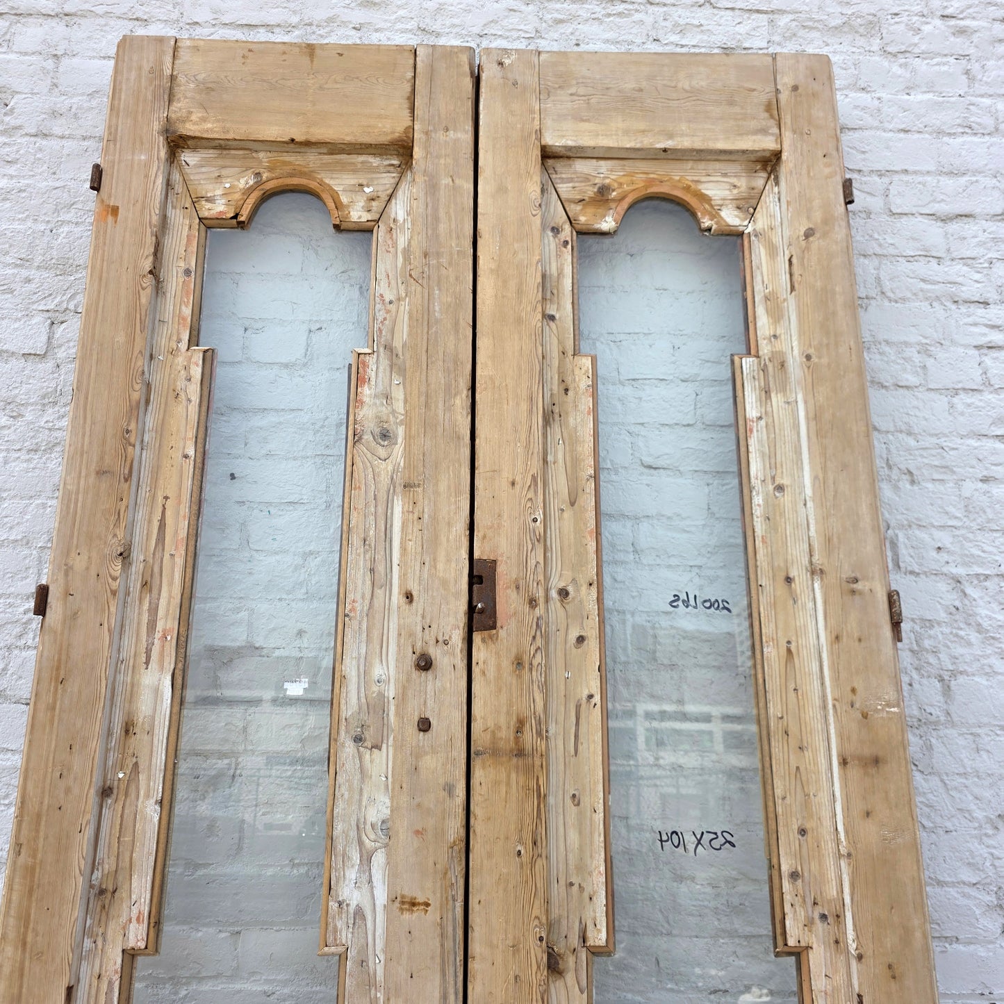 Pair of Antique Wood Carved Doors with Single Glass Lites