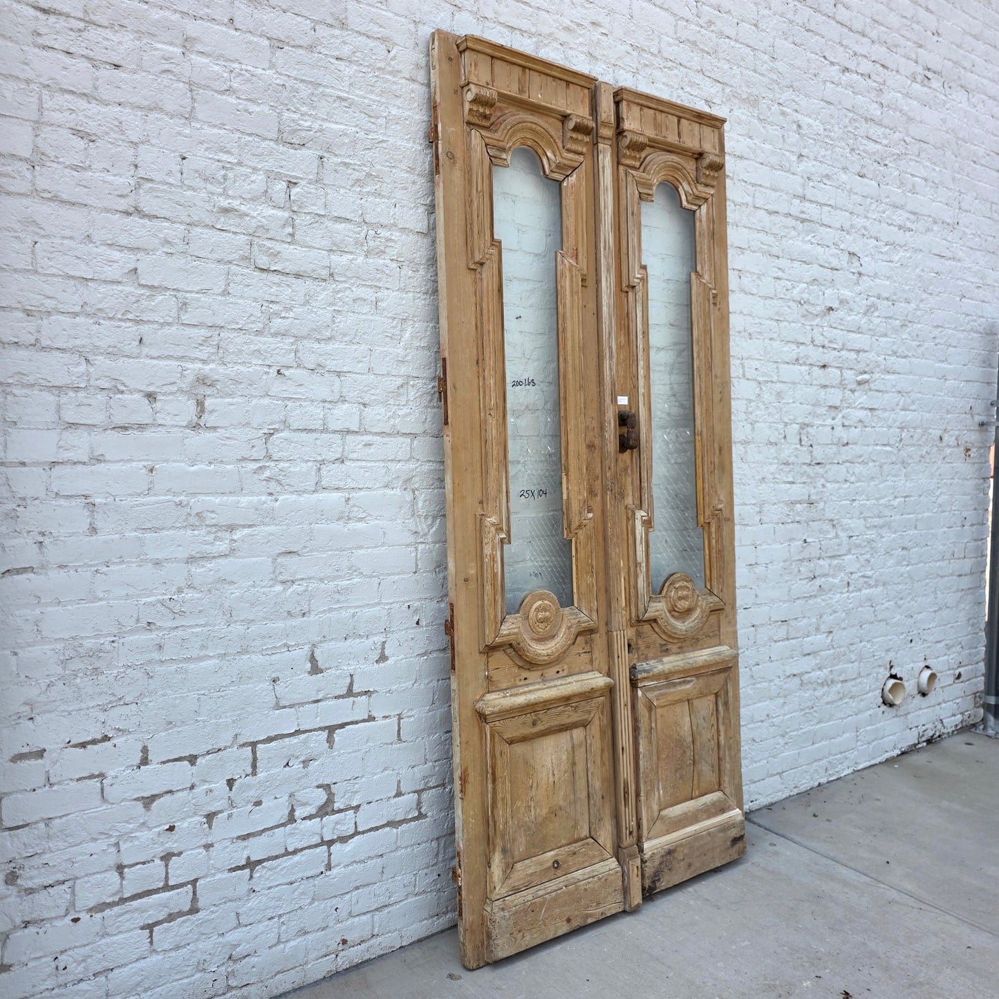 Pair of Antique Wood Carved Doors with Single Glass Lites