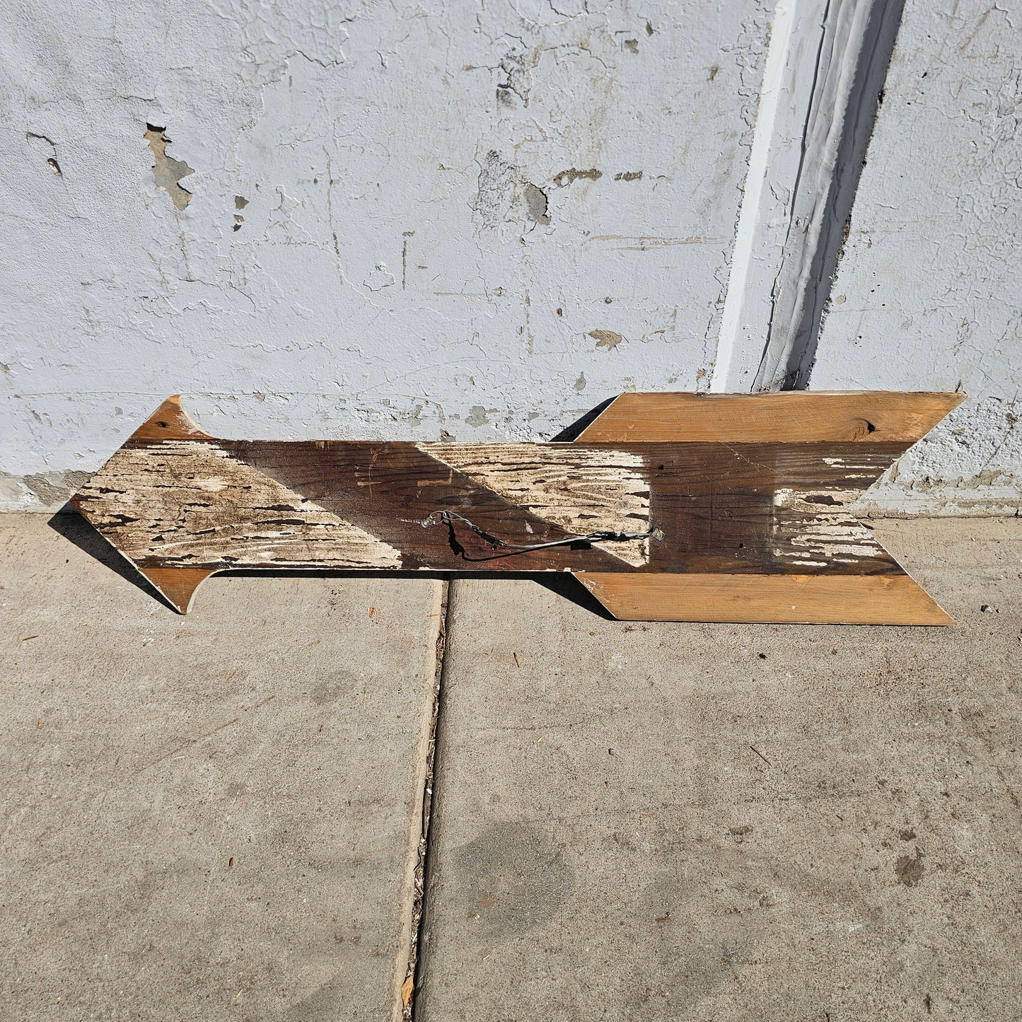 Painted Wooden Arrow Meals and Lodging Sign