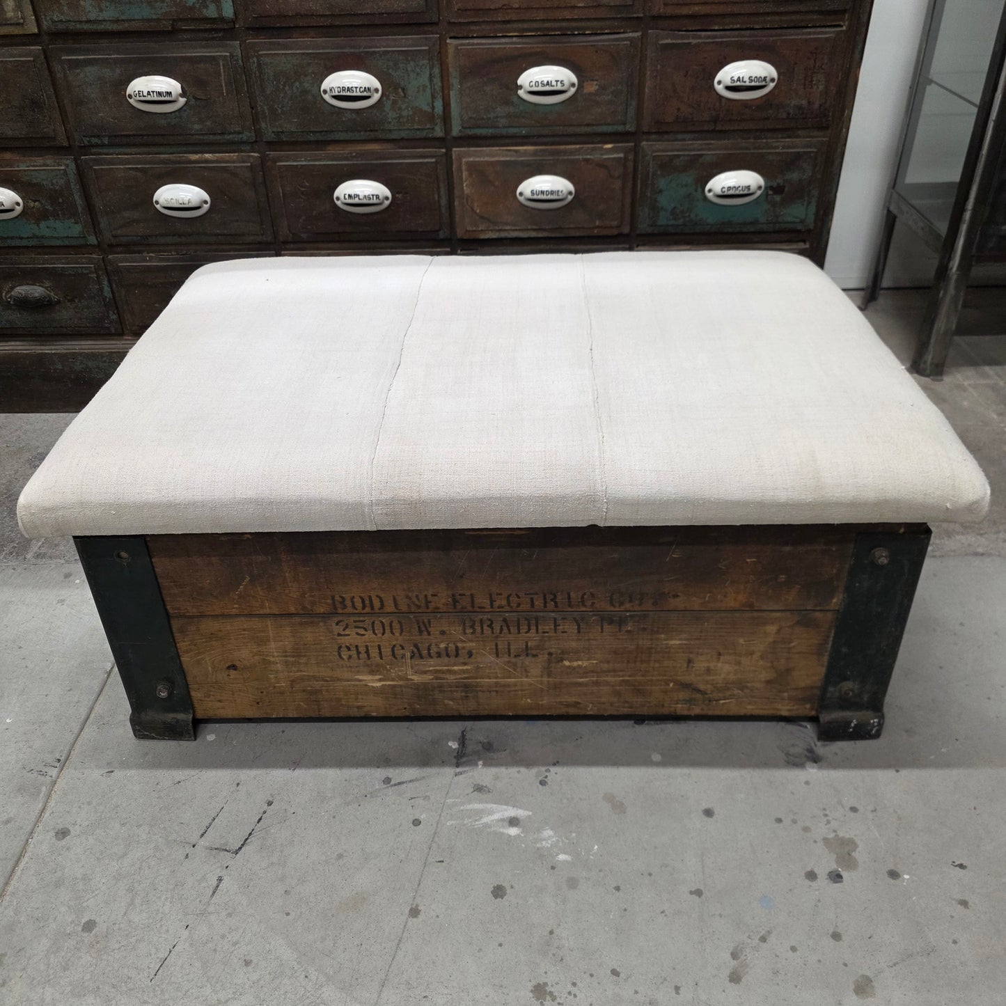 Bodine Electric Co.,Chicago Wooden Crate with Geain Sack Upholstered Top