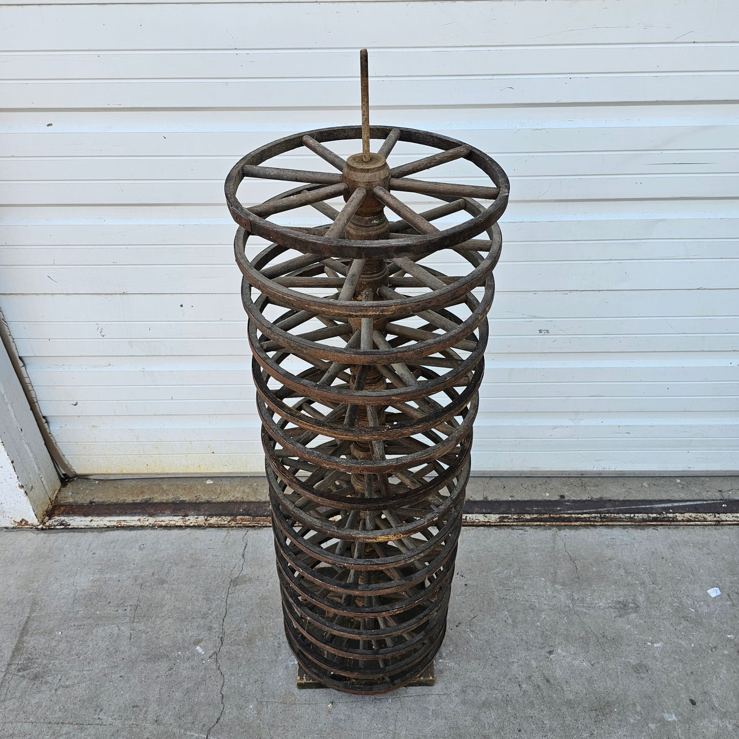 Display Stack of Antique Wooden Cart Wheels