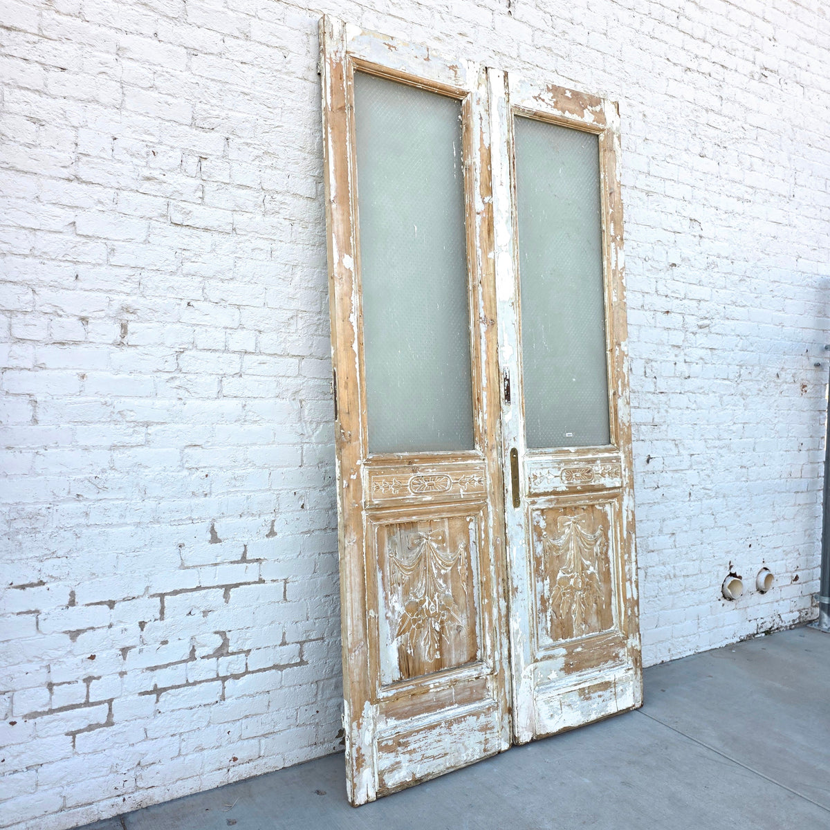Pair of Single Lite Carved Doors