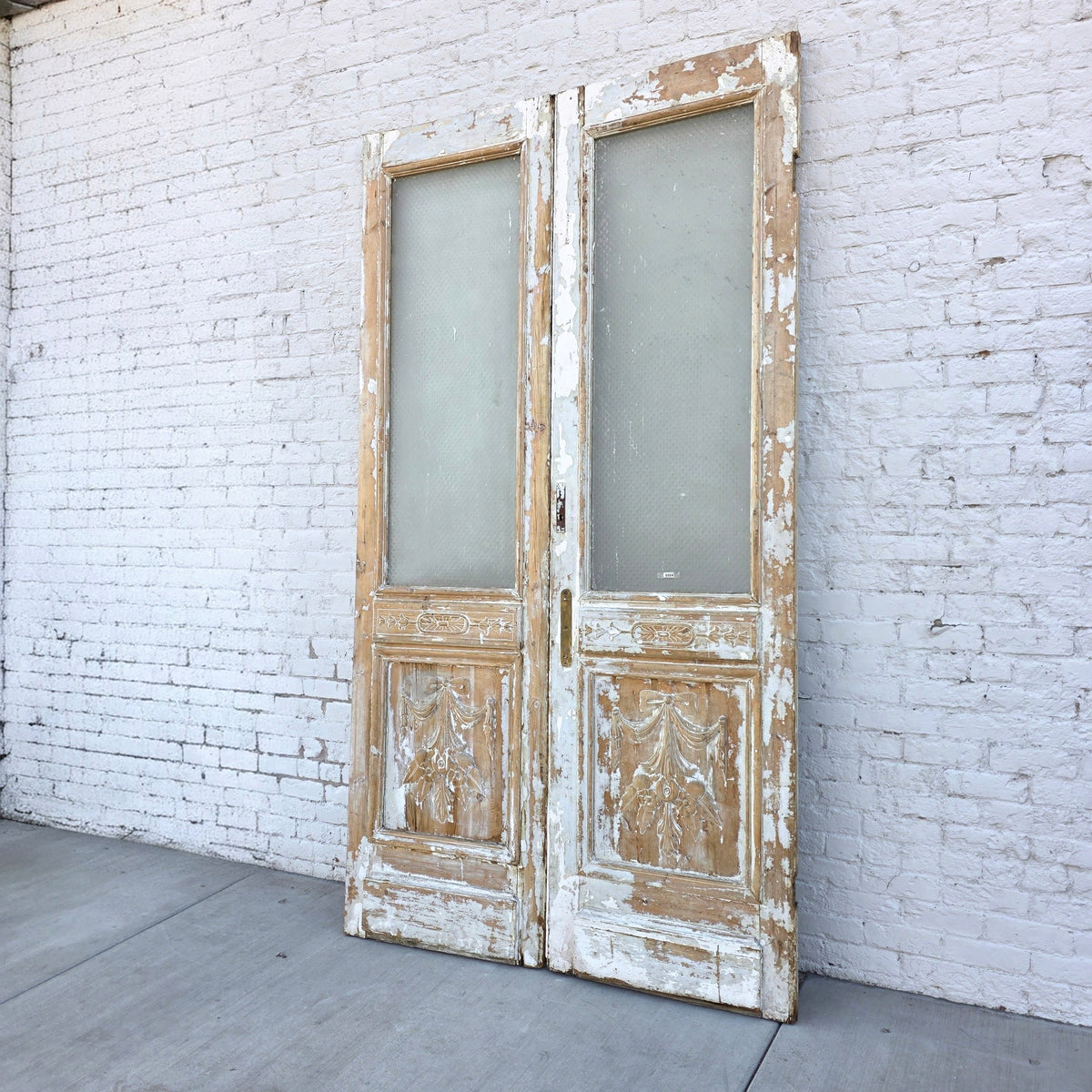 Pair of Single Lite Carved Doors