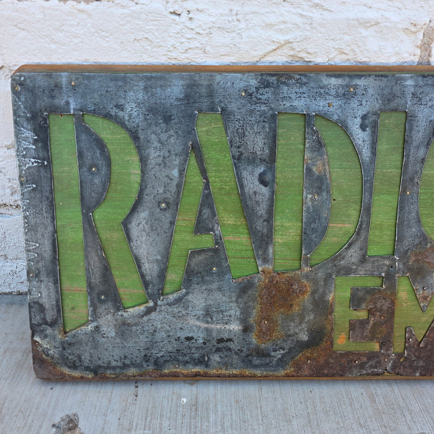 Radio Pharmacy Metal Sign on Wood