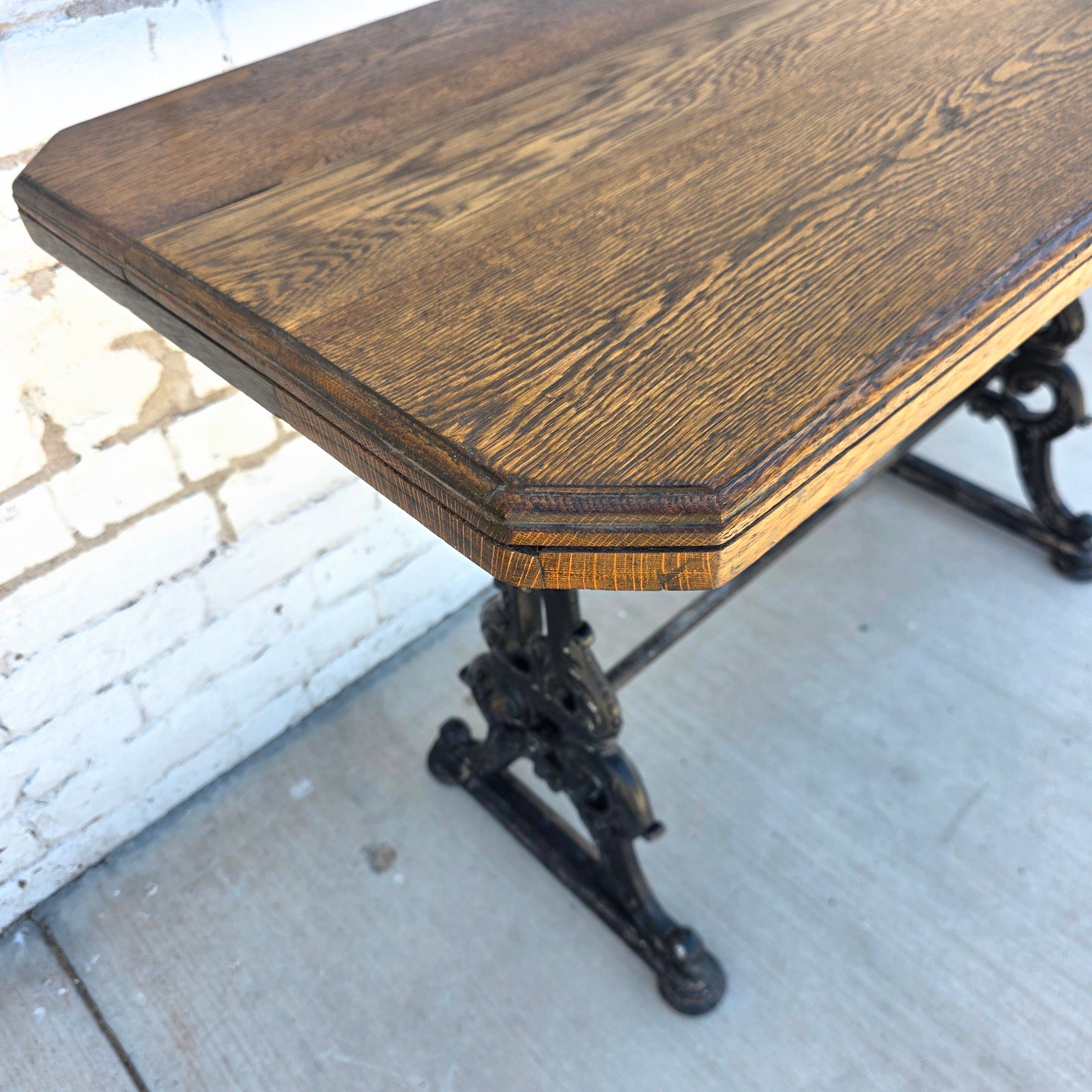 Antique English Pub Table with Ornate Iron Trestle Base