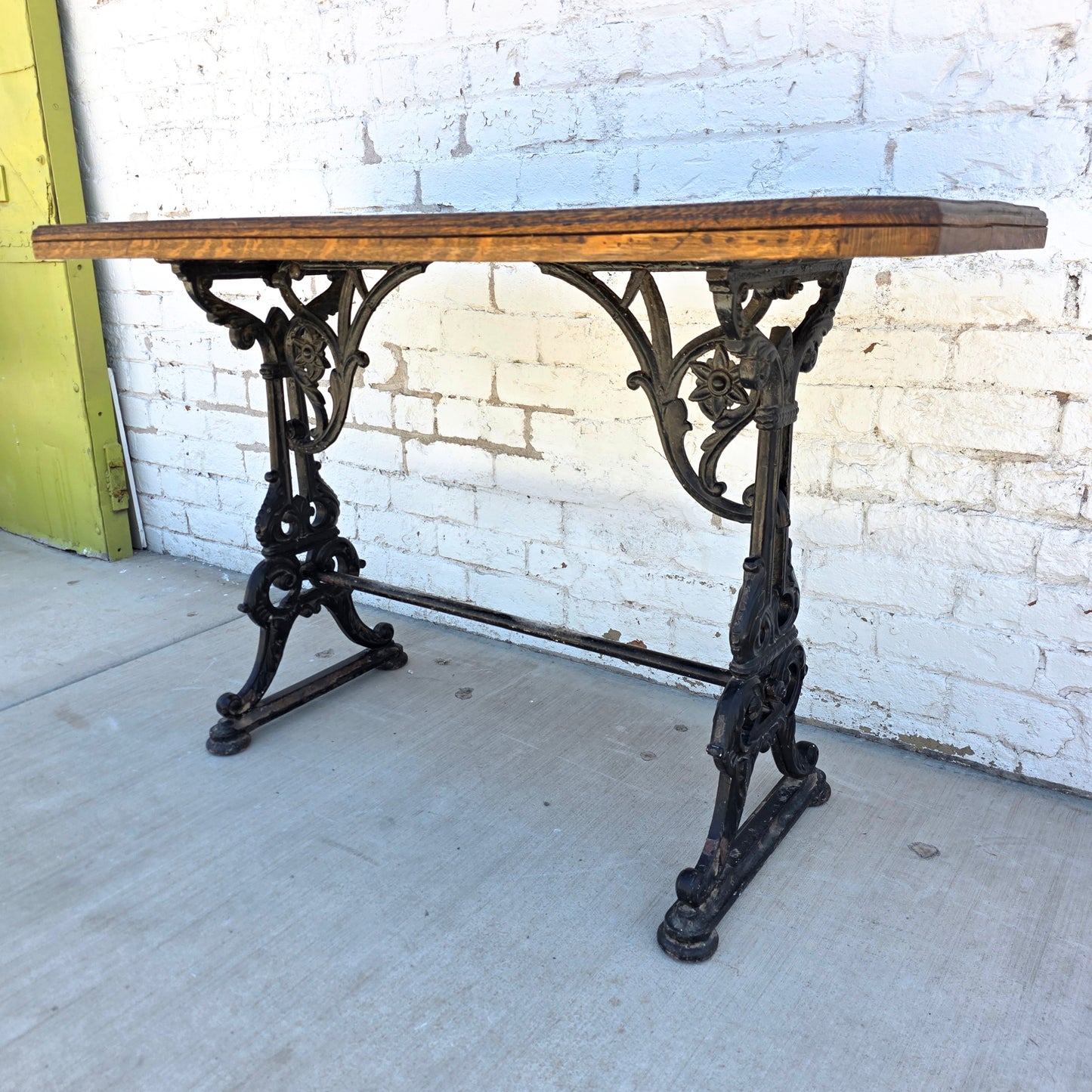 Antique English Pub Table with Ornate Iron Trestle Base