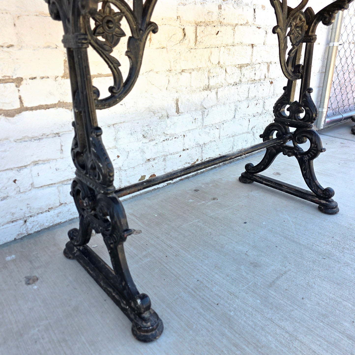 Antique English Pub Table with Ornate Iron Trestle Base