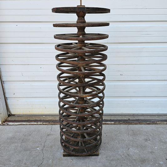 Display Stack of Antique Wooden Cart Wheels