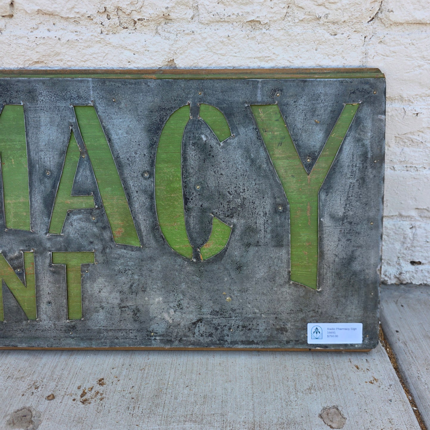Radio Pharmacy Metal Sign on Wood