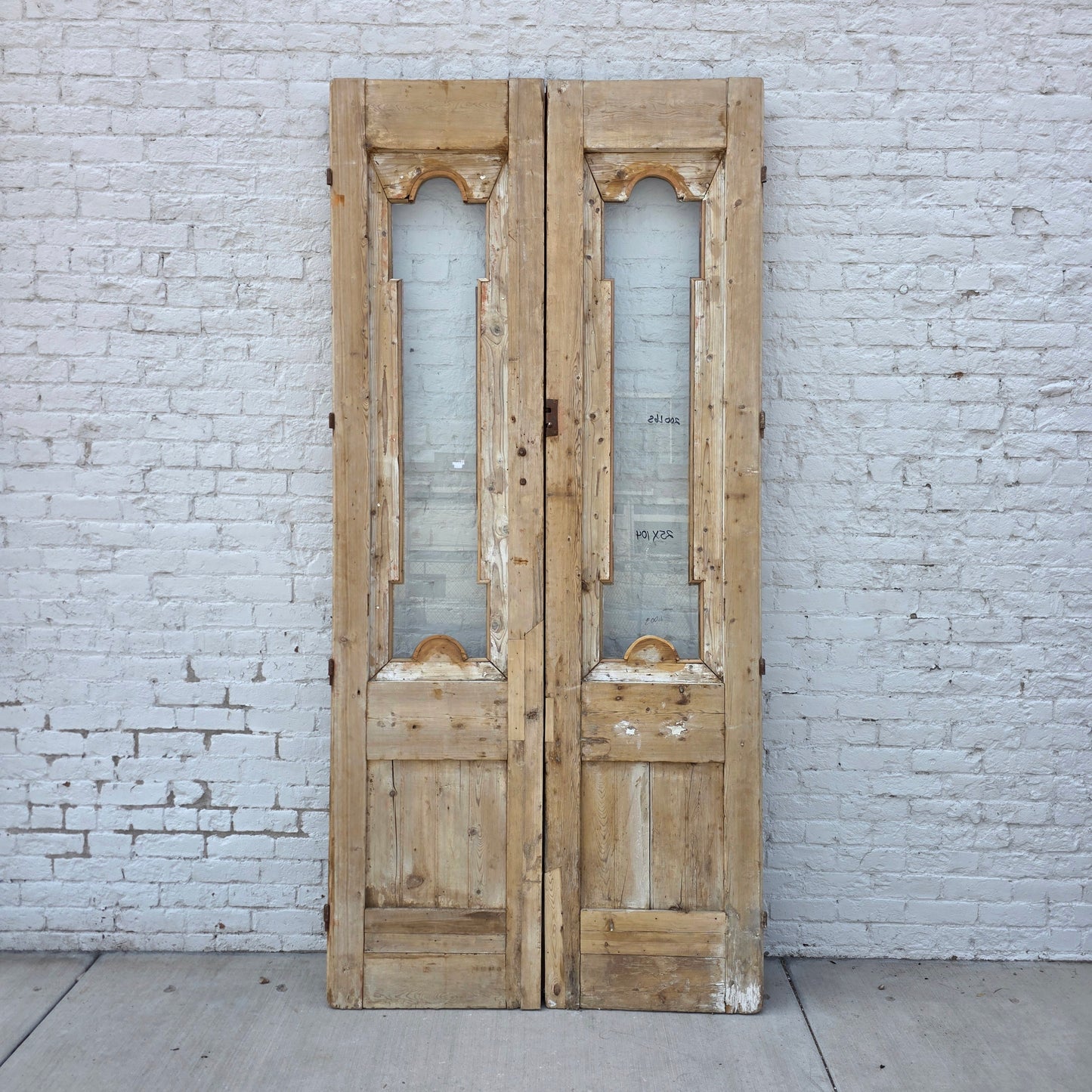 Pair of Antique Wood Carved Doors with Single Glass Lites