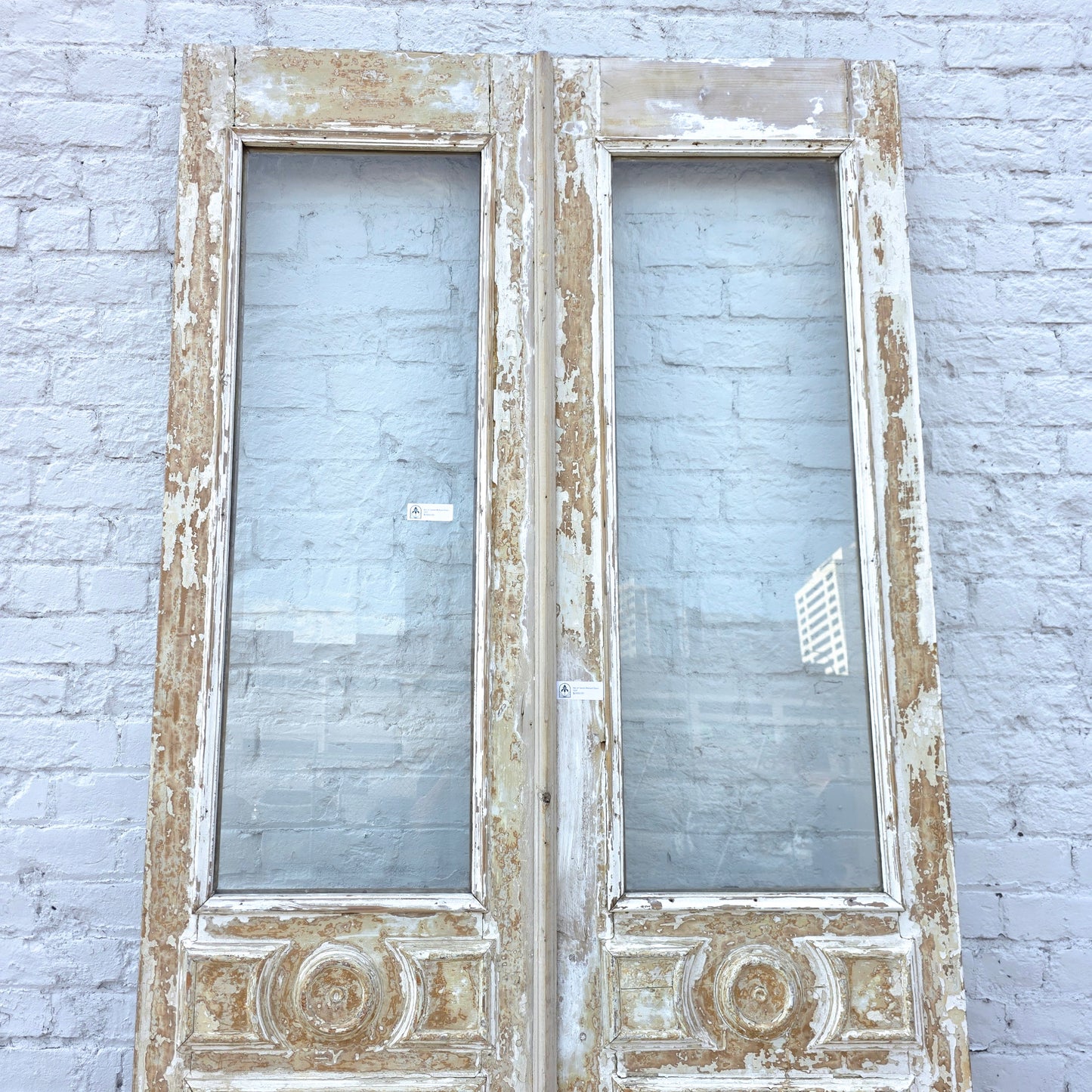 Pair of Washed Wood Single Lite Carved Antique Doors