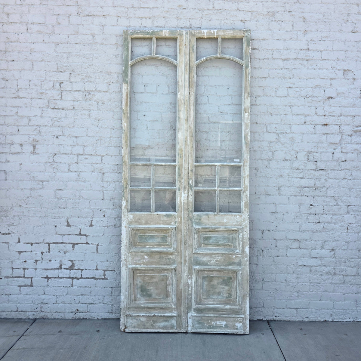 Pair of 2 Panel 7 Lite Washed Wood French Antique Doors