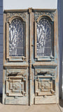 Pair of Ornate Wood Carved Antique Doors with Iron Inserts