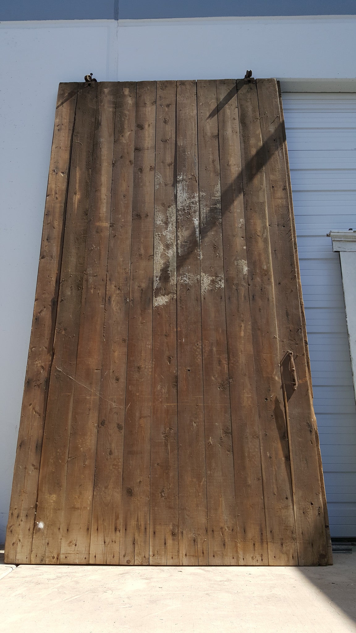Pair of 11 Panel Natural Wood Barn Doors
