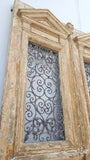 Pair of Antique Ornate Wood Carved Doors with Iron Scrollwork Inserts
