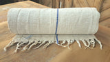 Roll of White Grain Sack Fabric with Blue Single Stripe