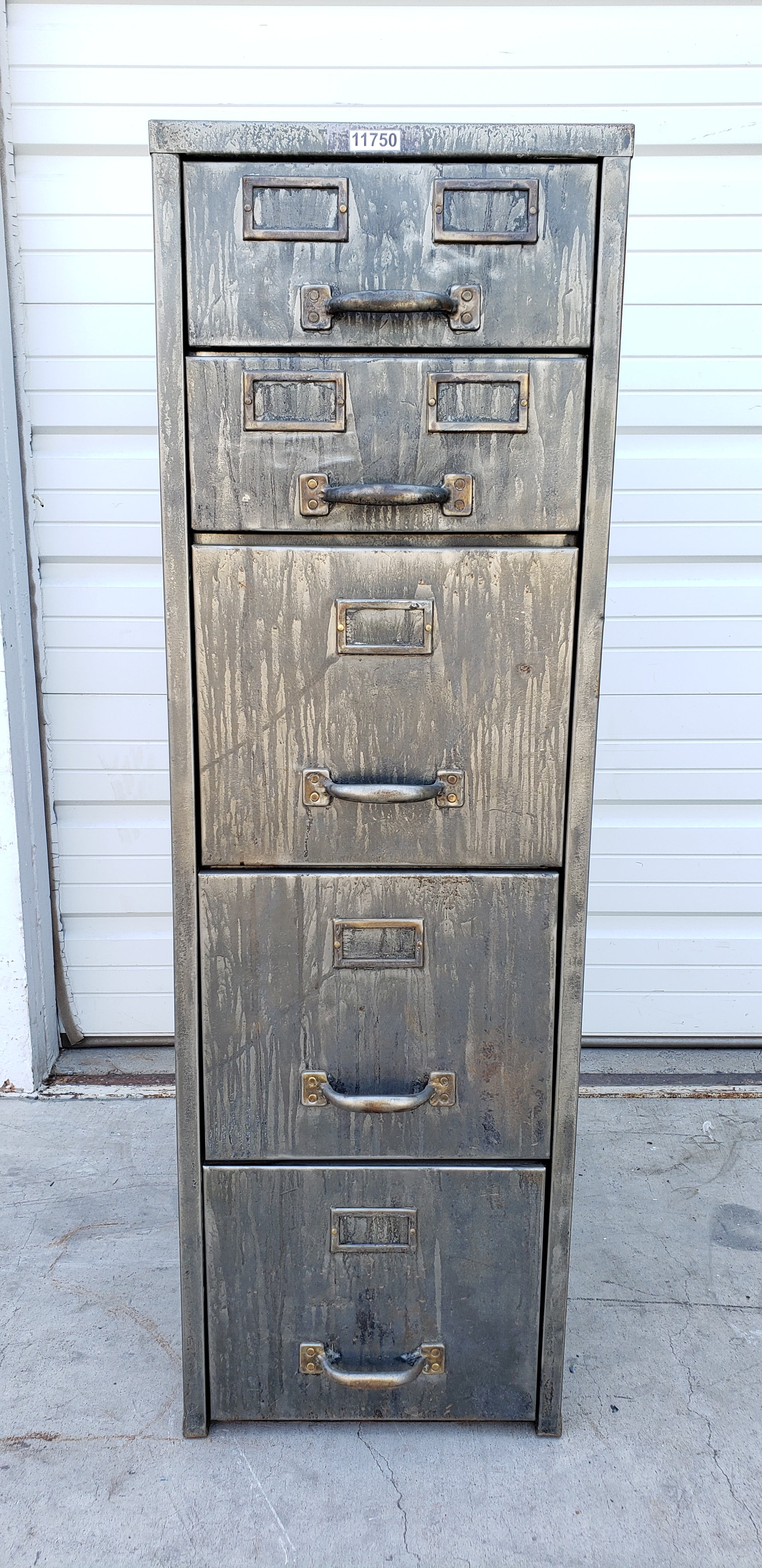 Stripped metal store filing cabinet